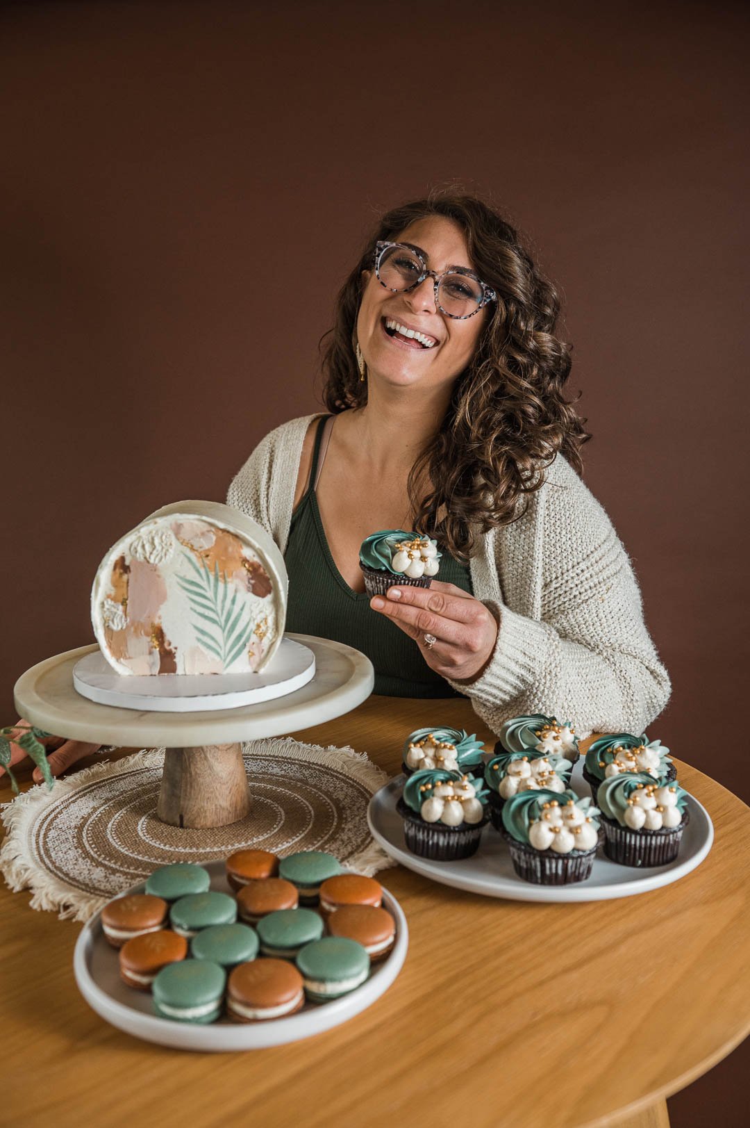 Woman-holding-cupcake.jpg