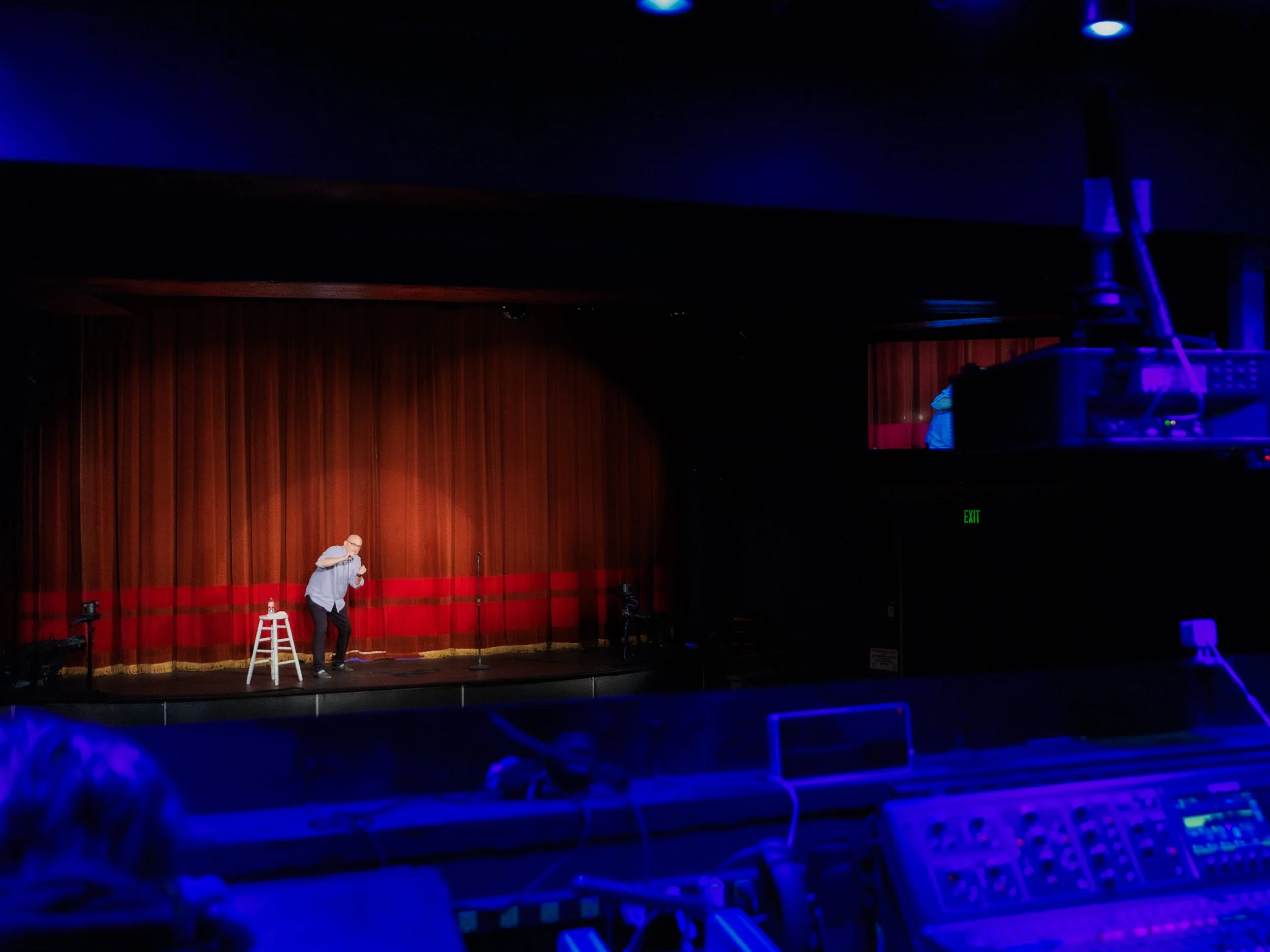 Brad Upton on stage at the Everett Historic Theater 