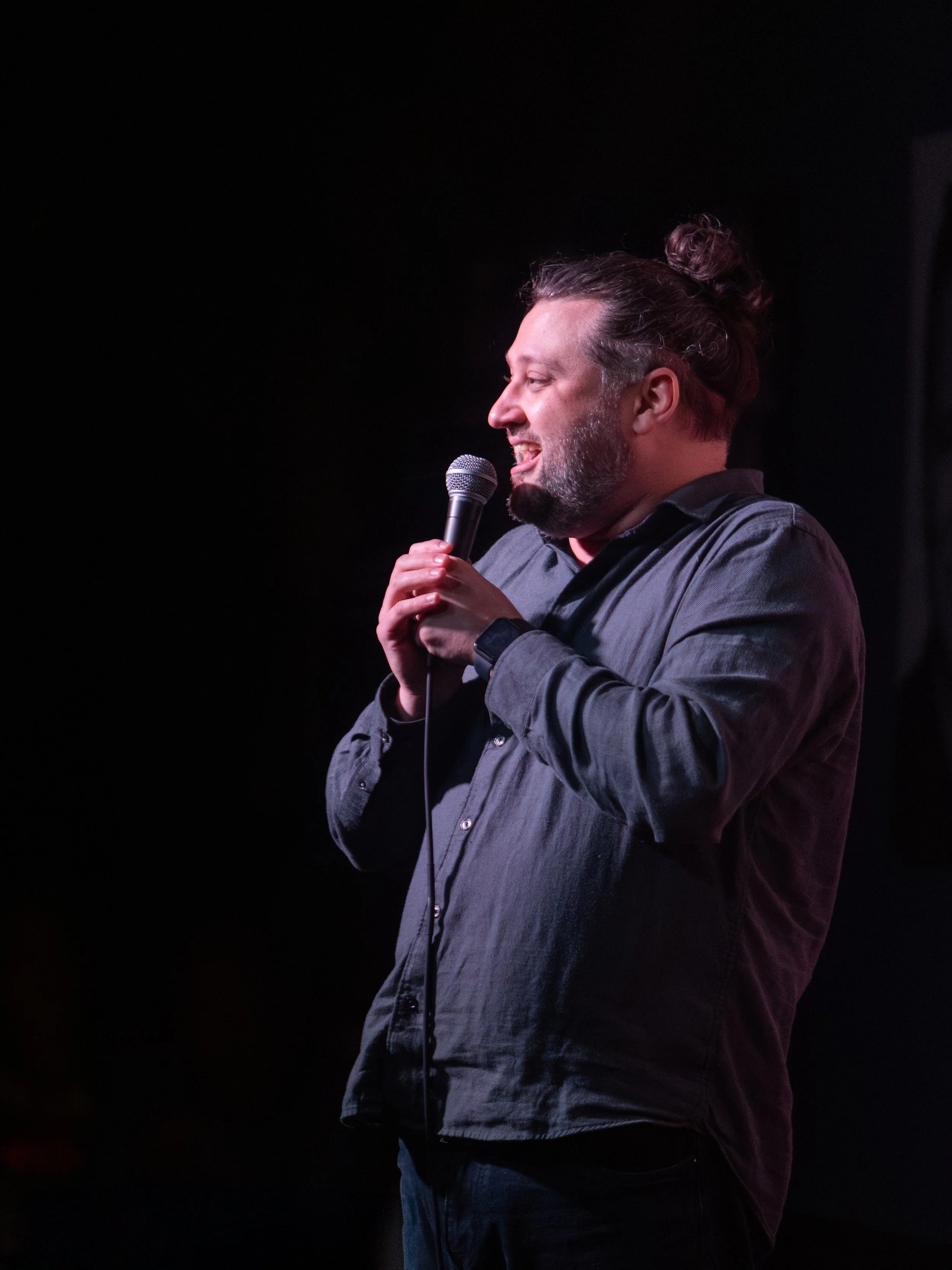 Mike Coletta, comedian, on stage, tacoma comedy club