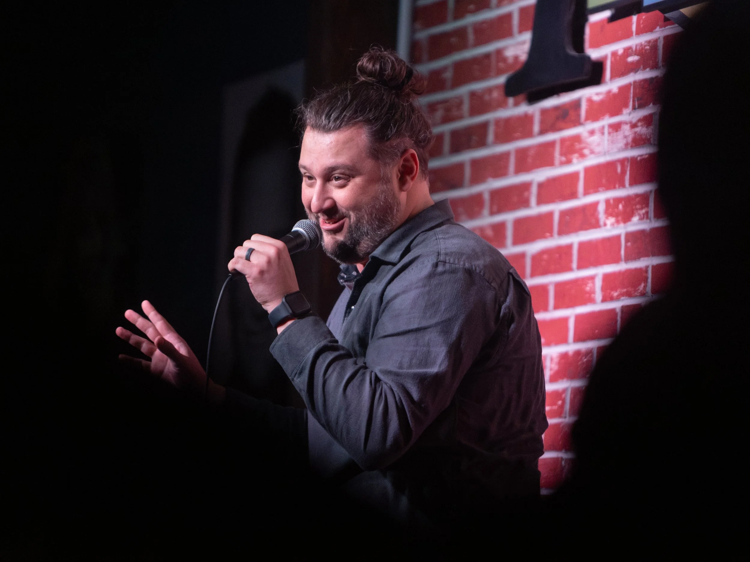 Mike Coletta, comedian, on stage, tacoma comedy club
