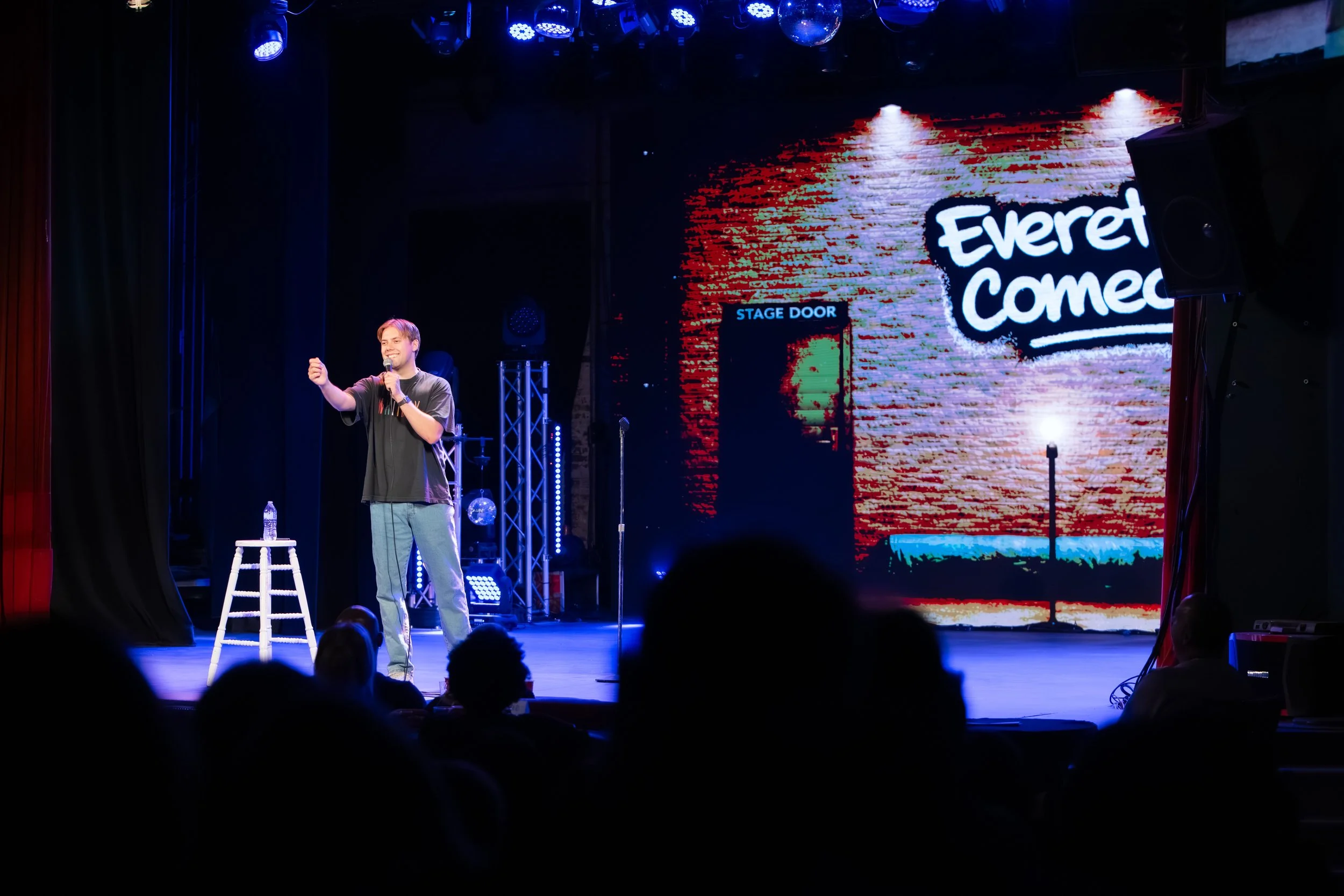 Bo Johnson on stage at the new everett theater featuring for everett comedy