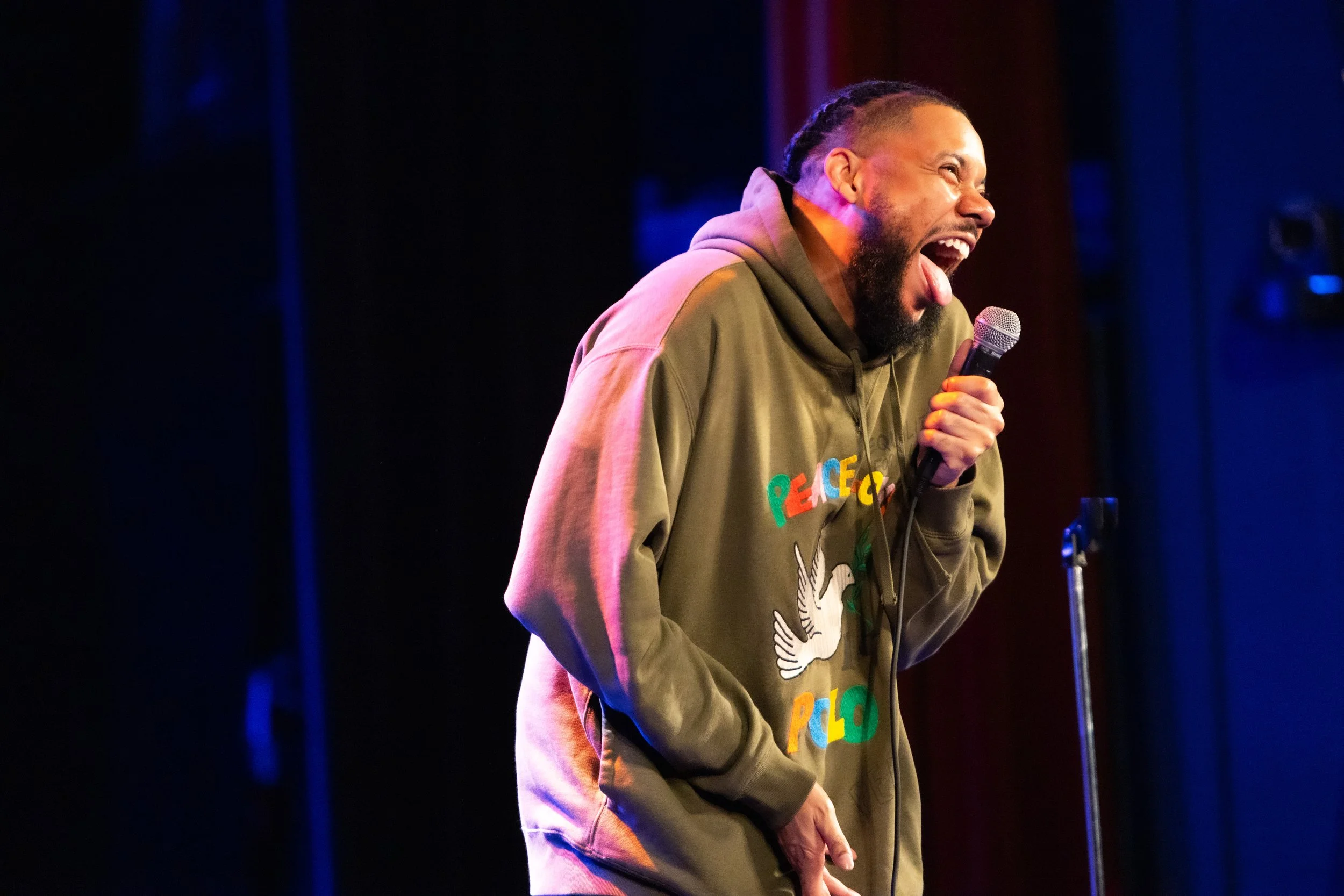 last comic standing's winner, clayton english makes a silly face on stage at the new everett theater for everett comedy hosted and produced by cory michaelis 