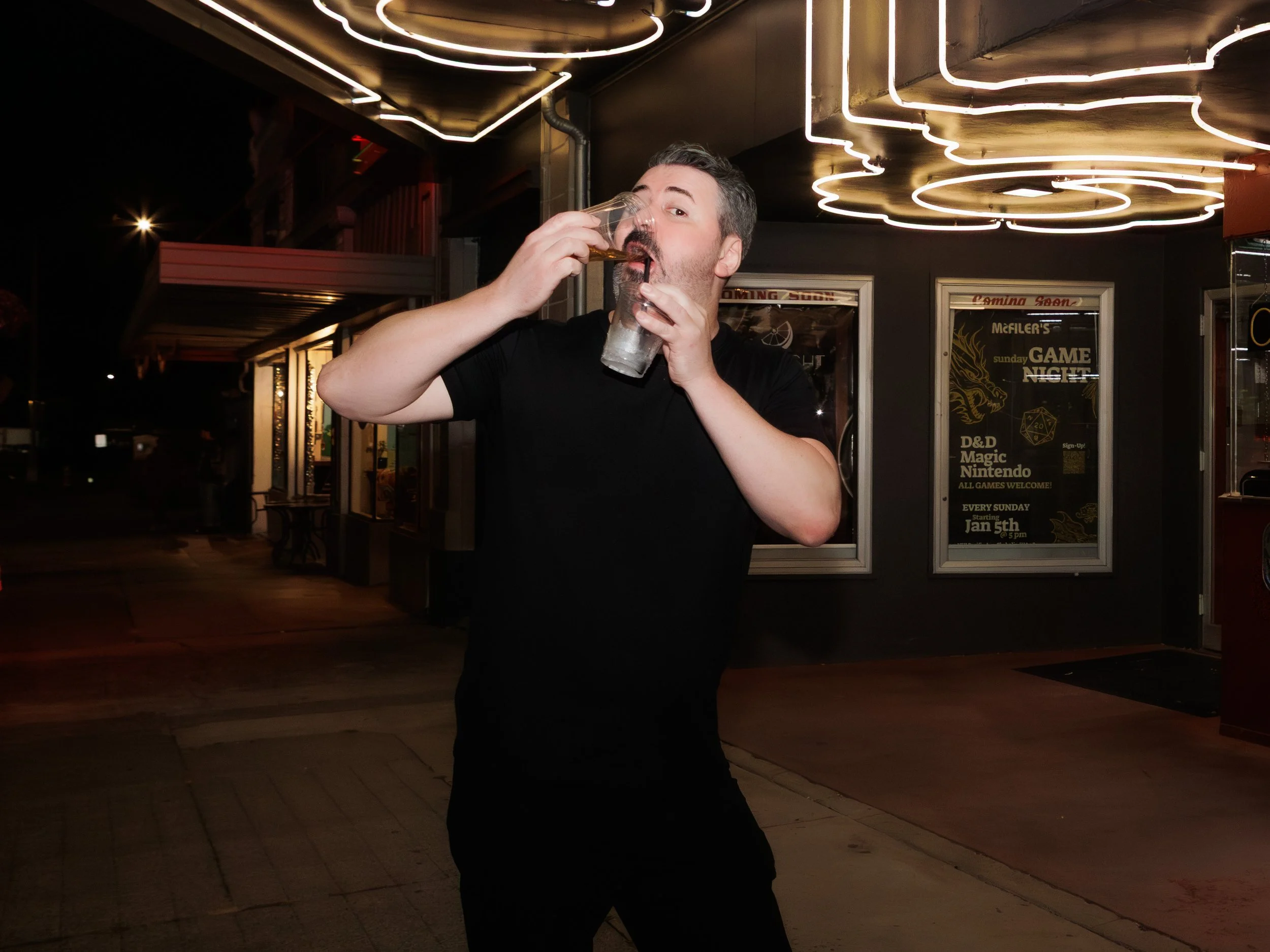 Pete Lee double fisting drinks after his comedy performance in chihalis washington 