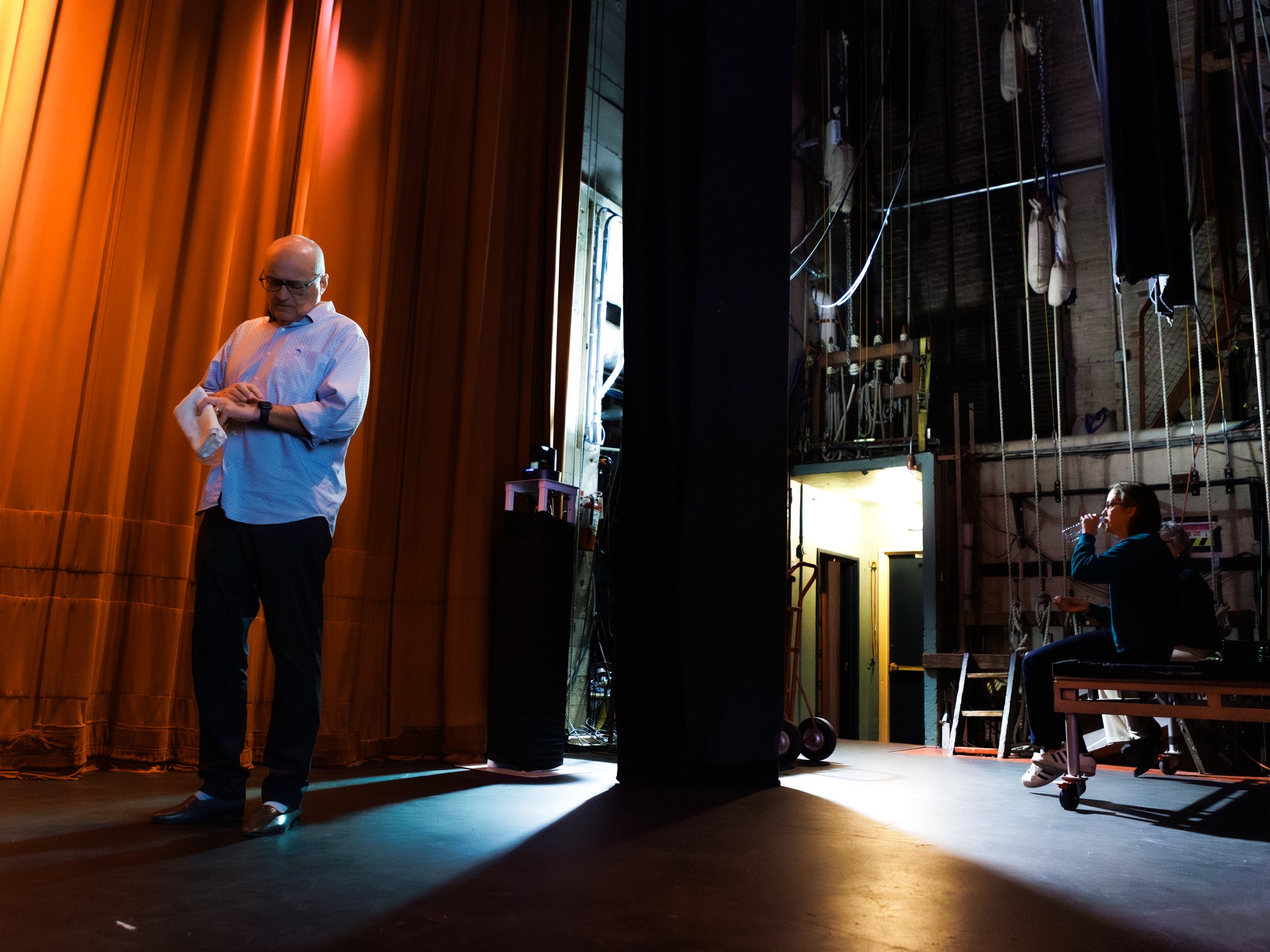 Brad Upton behind the scenes, gabey lucas and julie upton watching the monitor, everett theater, everett comedy