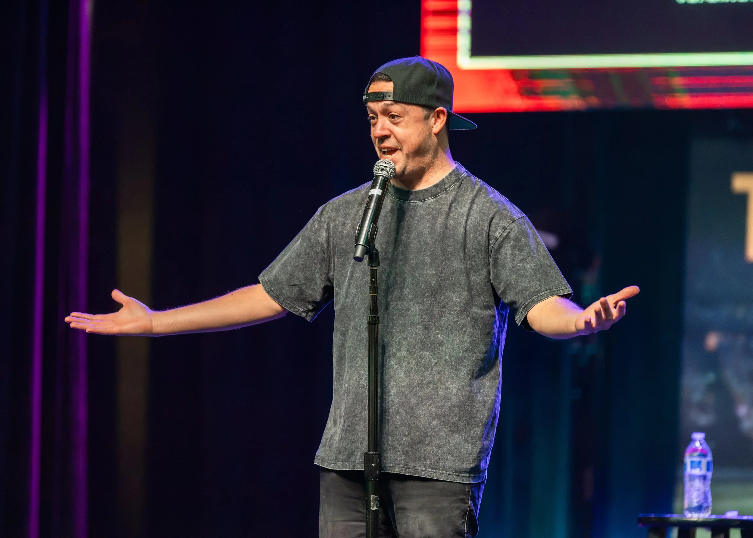 Jose Bolanos performs live at the Jose & Friends comedy show at Muckleshoot Casino, photographed by Tayler Berard Creative.