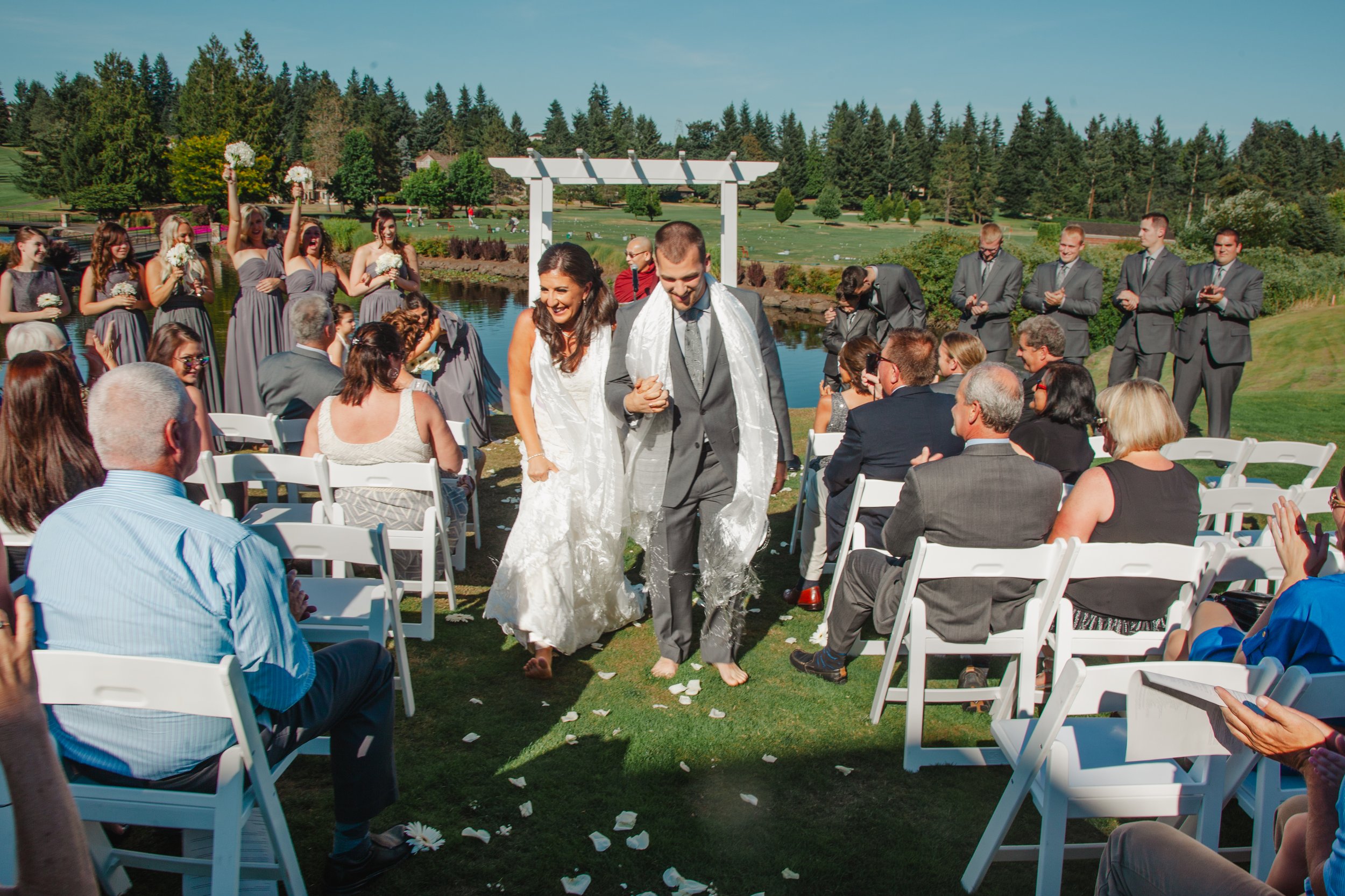 bride and groom leaving ceremony, wedding at meridian valley country club, ceremony, budist ceremony