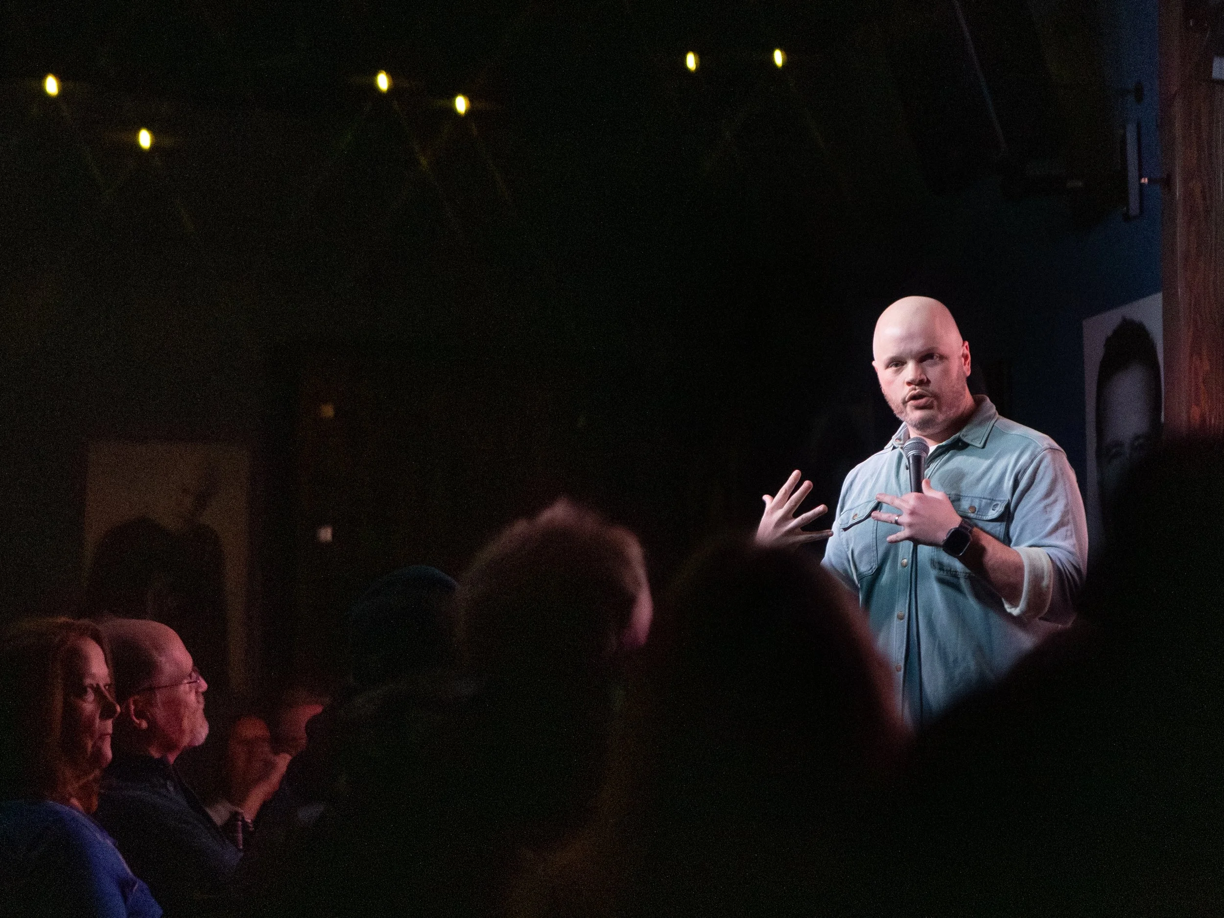 JR Berard, on stage, comedian, tacoma comedy club, 6th and proctor