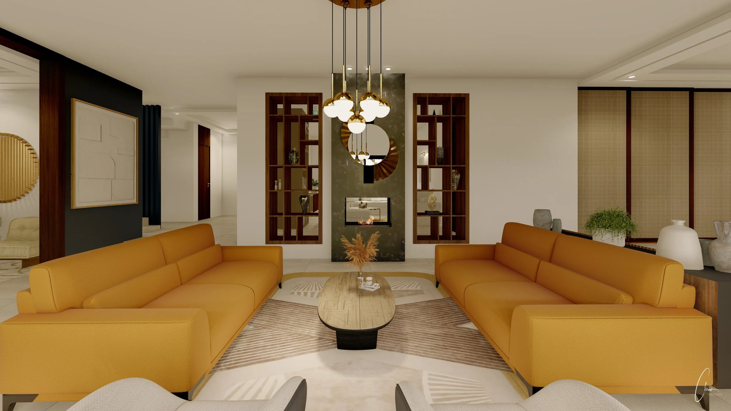Salon de réception avec canapés ocre et cheminée habillée de pierre, aménagement d'une villa à Marrakech