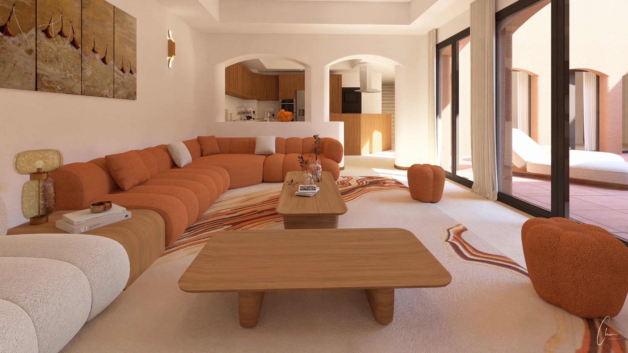 Détail du coin salon, mobilier aux lignes douces et table basse en bois sculpté