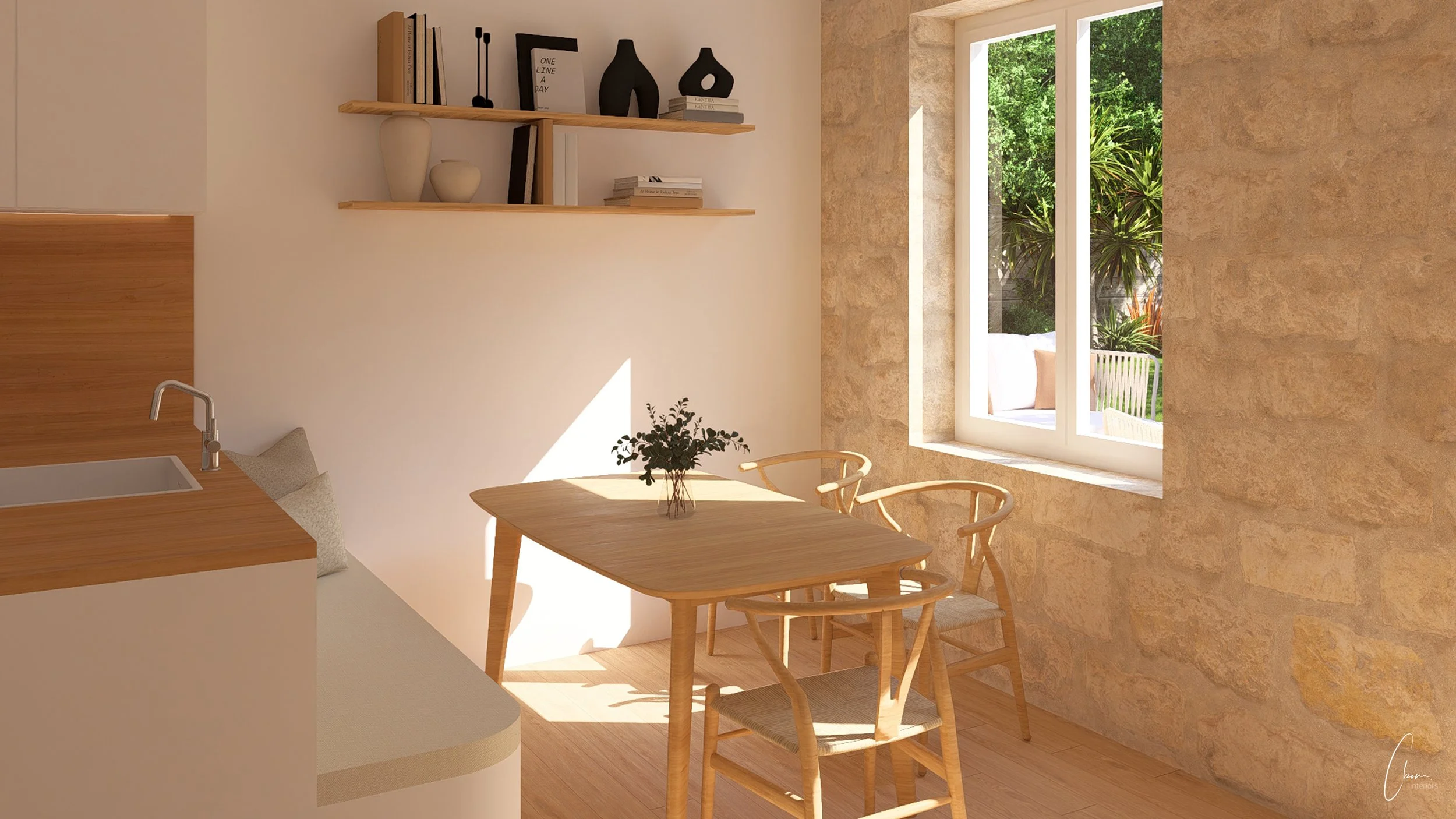 Dining nook with wooden table facing an exposed stone wall, interior design of a renovated wine vat house