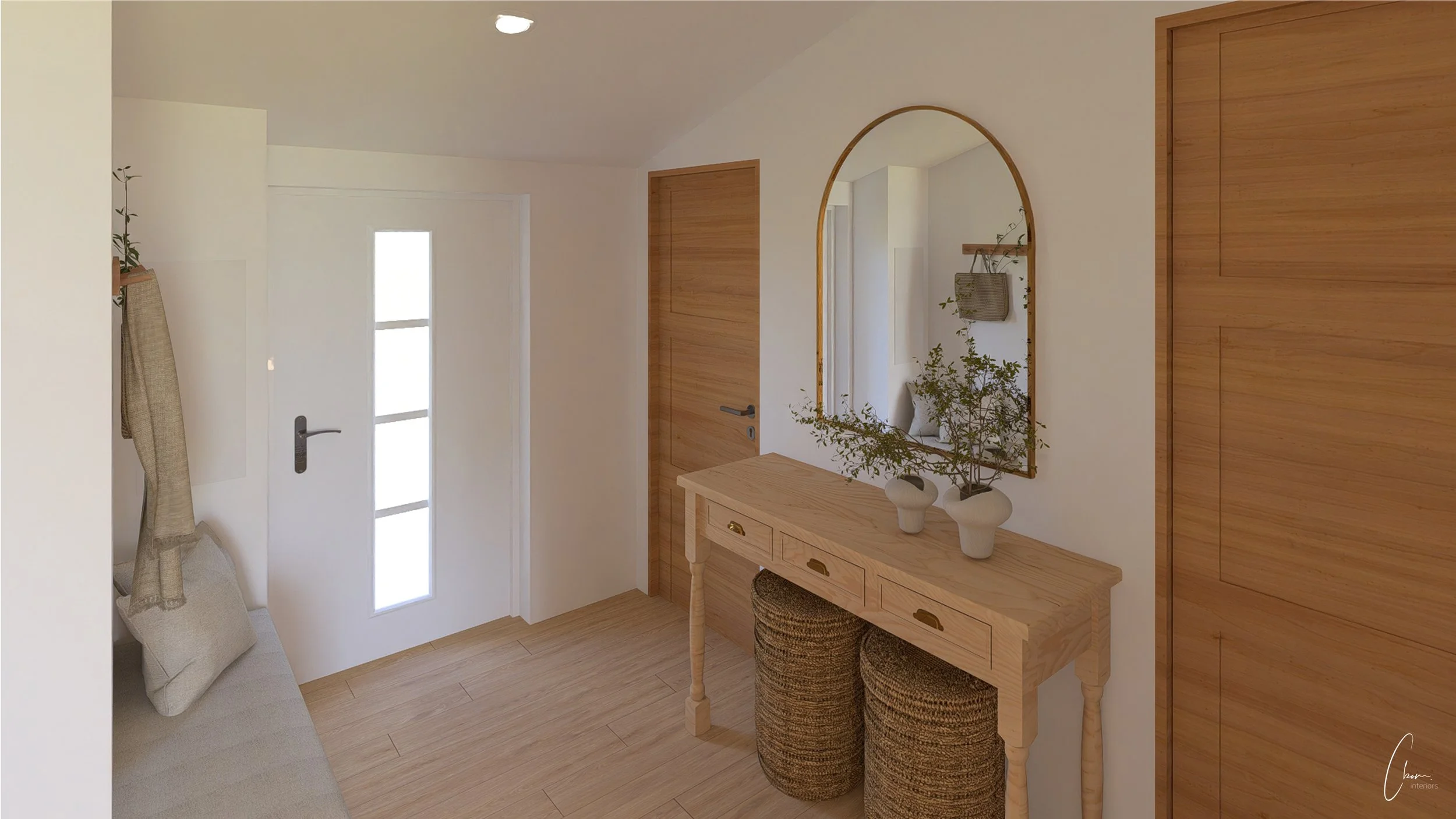 Hall d'entrée lumineux avec console en bois et miroir arqué, aménagement intérieur près de Bordeaux