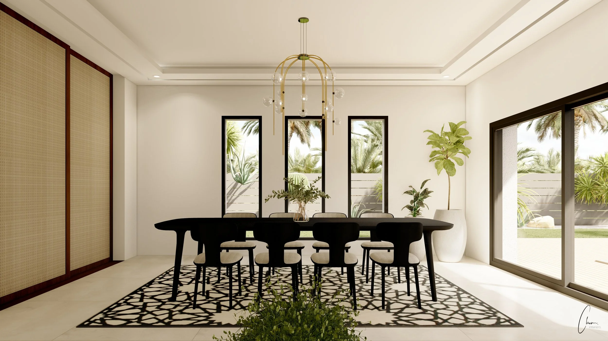 Dining room with large black table and golden pendant light, interior architecture of a Marrakech villa