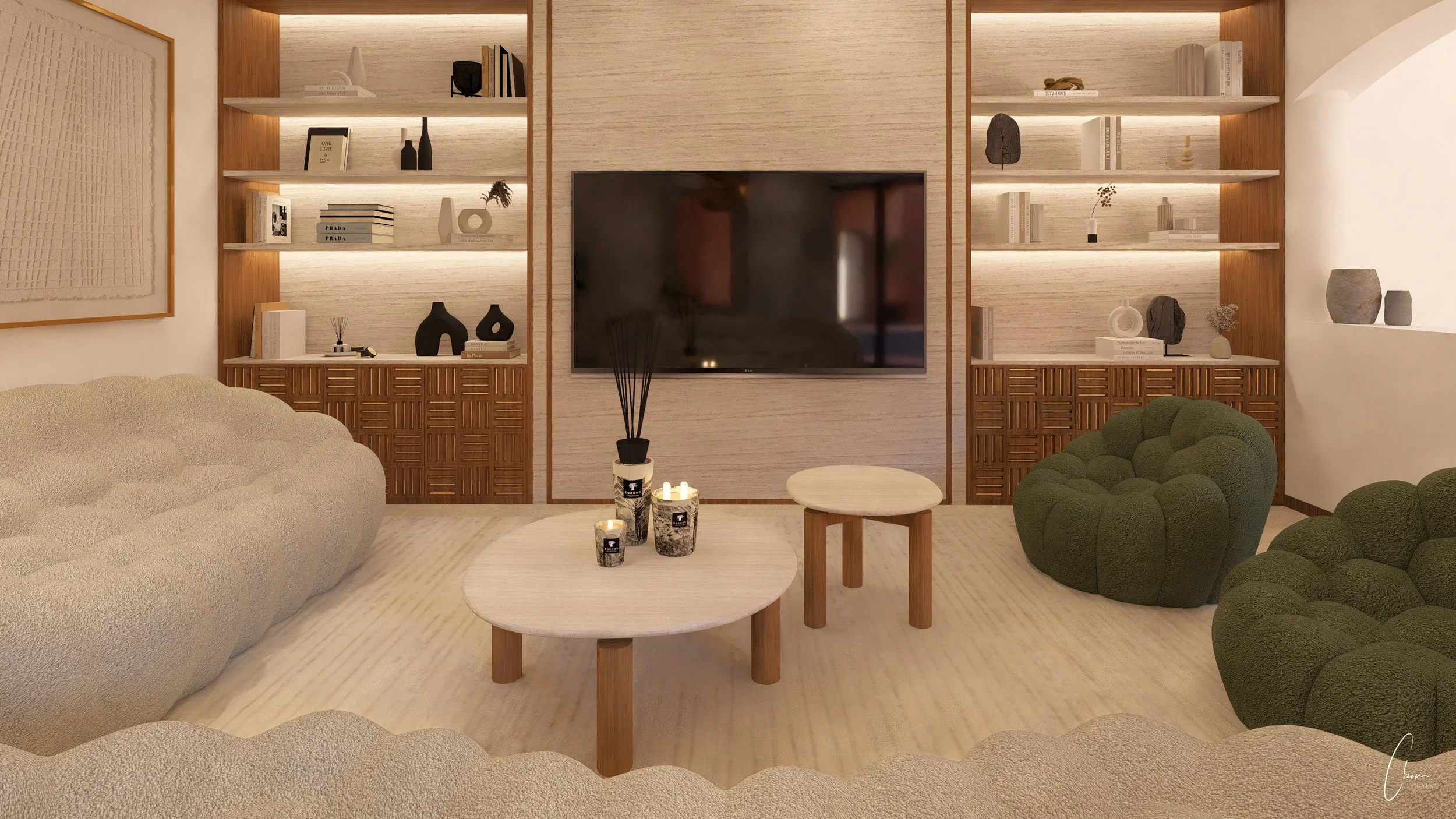 Salon familial avec fauteuils enveloppants crème et vert, bibliothèque en bois sur mesure