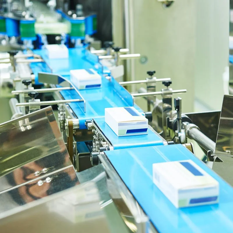 Pharmaceutical manufacturing assembly line
