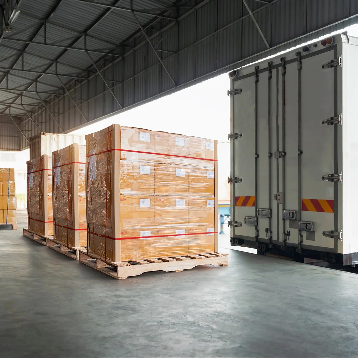 Pallets loaded with boxes about to be shipped in a semi-truck