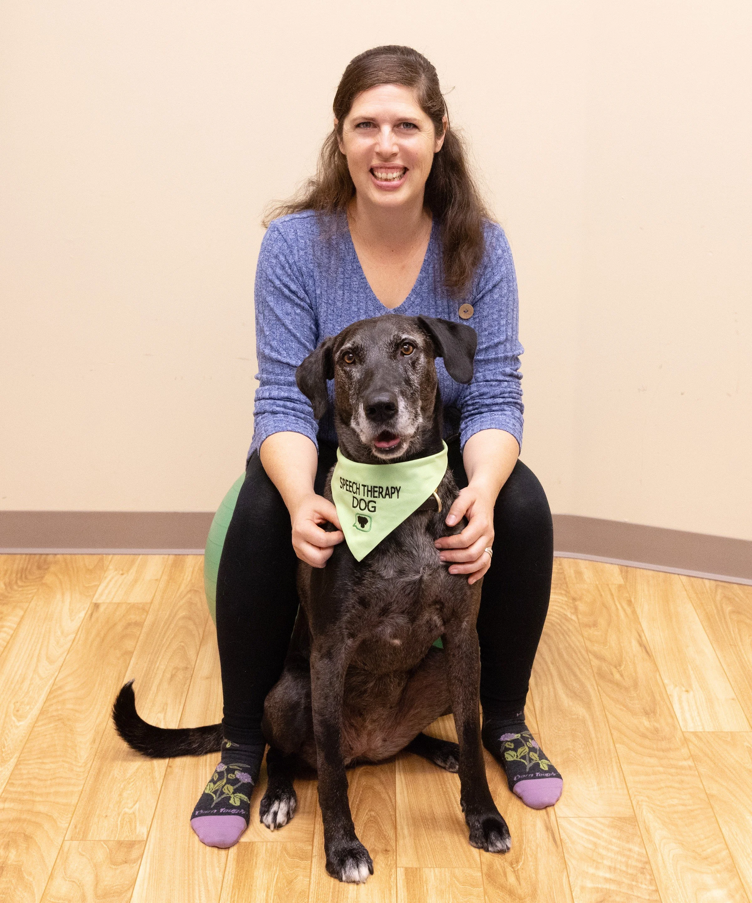 Animal-assisted speech therapy with Sharlet Jensen and speech therapy dog Delta.