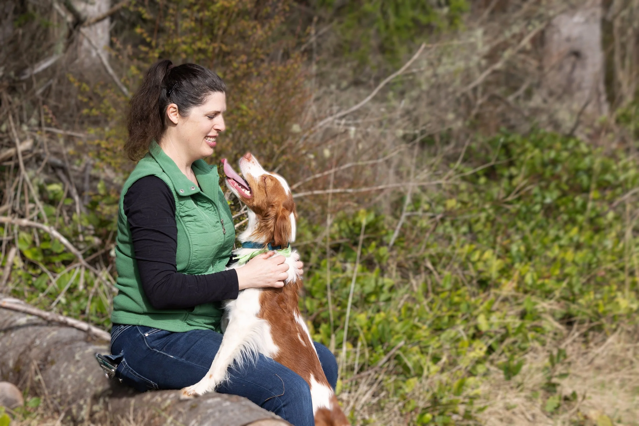 Sharlet and speech therapy dog Sky in nature after a day of animal-assisted therapy (dog AAI).