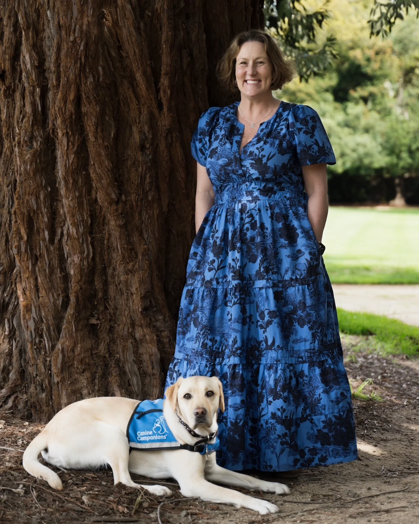 Facility dog Brandy provides animal-assisted speech therapy with Jennifer Mitchell.