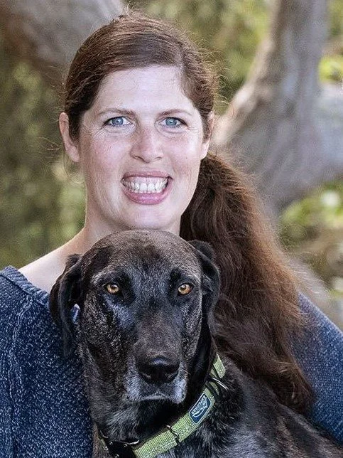 Animal-assisted speech therapist Sharlet Lee Jensen holds speech therapy dog Delta.