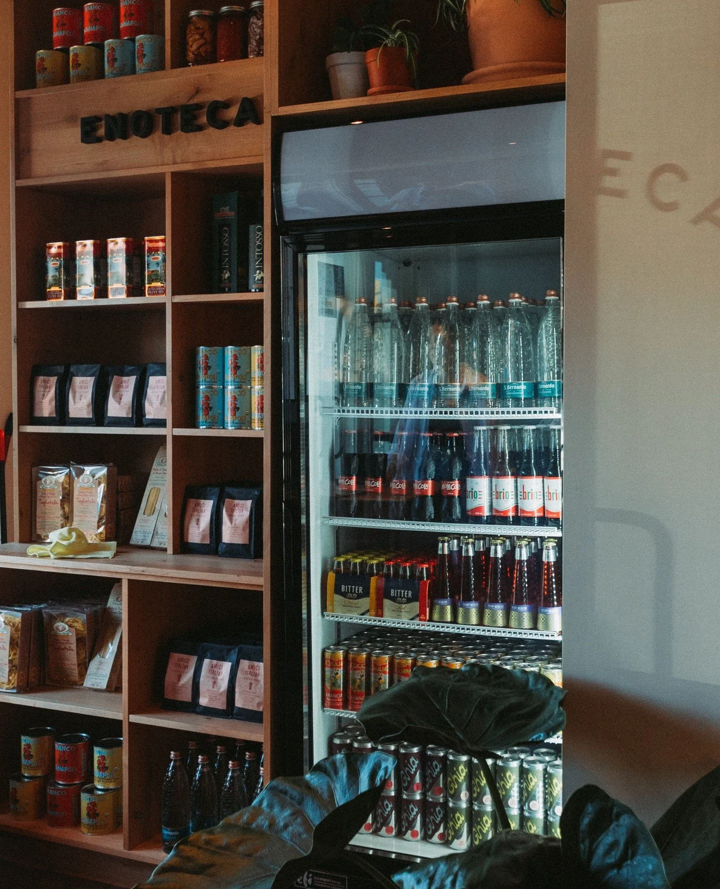 Our cooler&rsquo;s stocked with refreshing Italian sodas, spritz mixers, and all kinds of bubbly goodness, perfect for a midday pick-me-up or weekend treat. Pairs well with Piccolo Pizza to-go.⁠
⁠
And just beyond the bar, our Enoteca is filled with h