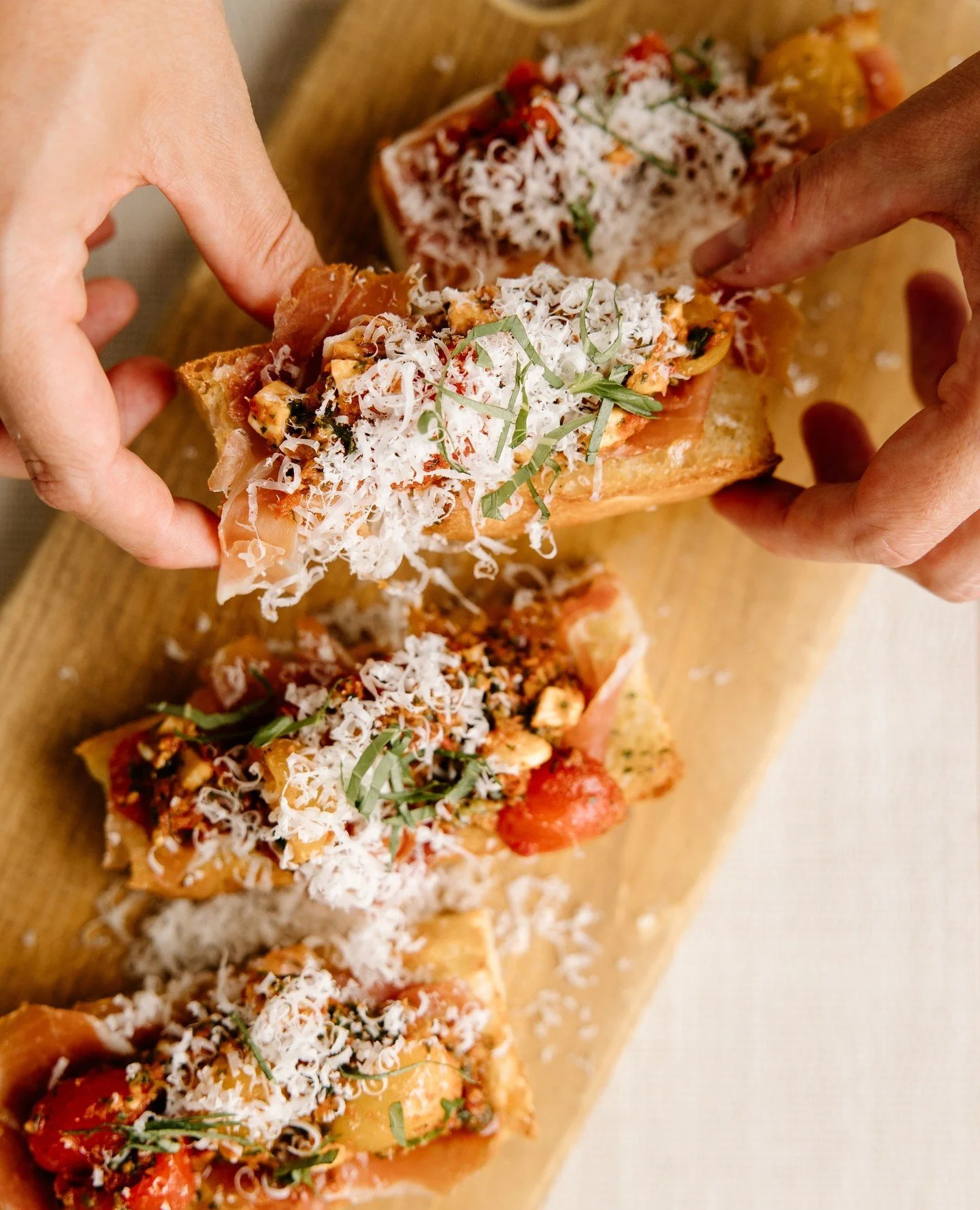 Freshly baked focaccia layered with garlic butter, marinated mozzarella, cherry tomatoes, sun-dried tomato and basil pesto, finished with Grana Padano and fresh basil. Our bruschetta is simple, soulful, and made to share over a crisp Italian wine.