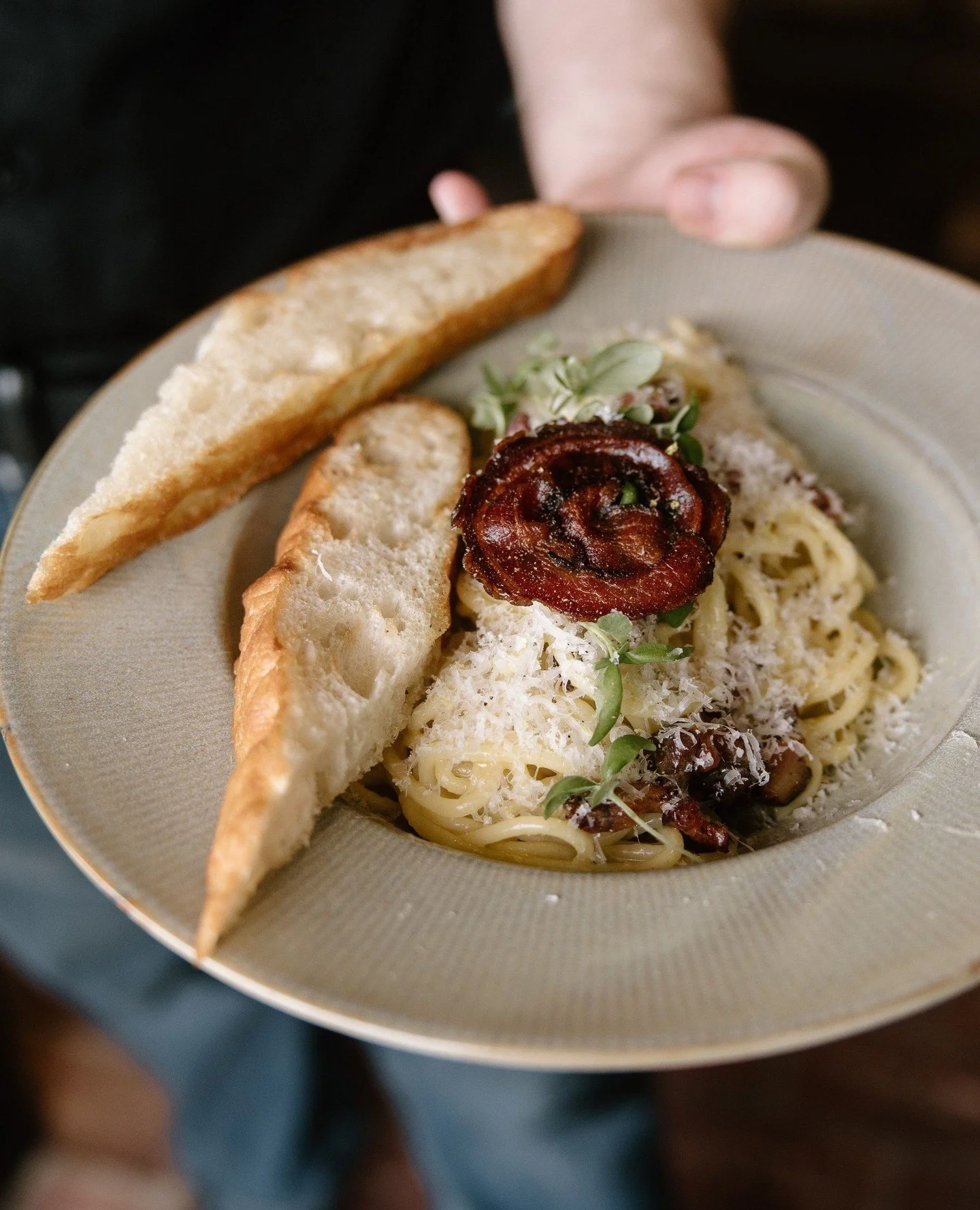 Starting today we&rsquo;re serving a classic close to our hearts.⁠
Spaghetti Carbonara, rich and silky, topped with micro basil and a crisp of pancetta. Served with a warm slice of garlic bread for that perfect finish.⁠
⁠
Available for one month only