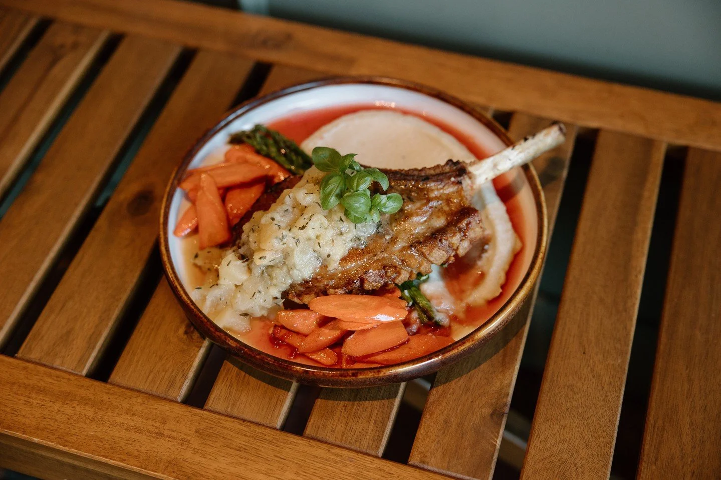 A new feature worth gathering for. Our pork tomahawk, perfectly cooked and plated with celeriac pur&eacute;e, seasonal veg, and a rich pear, thyme, and shallot compote finished with raspberry gastrique.⁠
Rich, balanced, and made to be shared.⁠
⁠
Whil