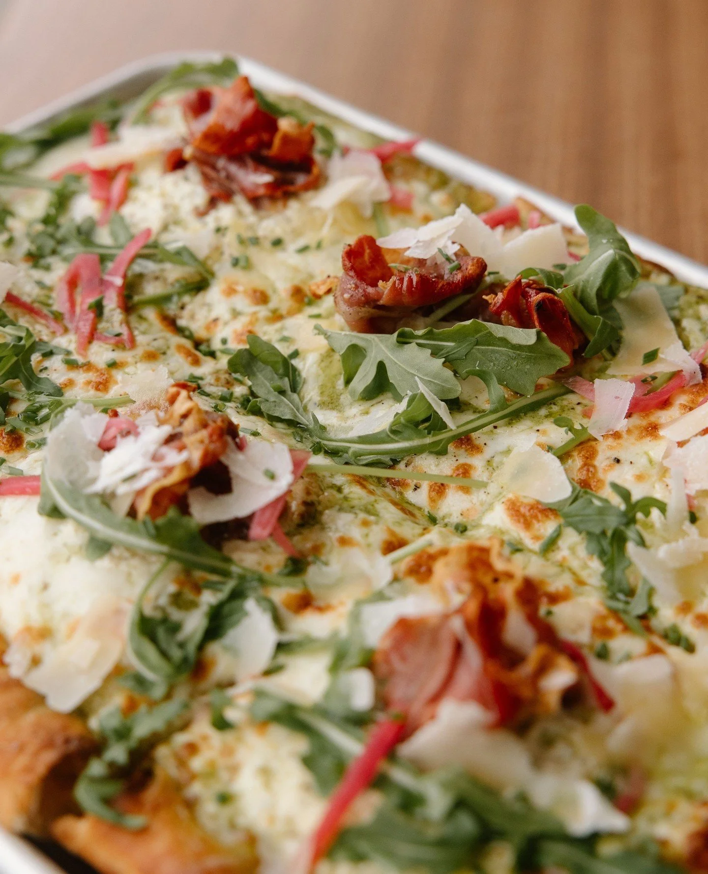 This month&rsquo;s feature brings together prosciutto and whipped feta in what might be the best Italian love story of the season. 🍕⁠
⁠
Come enjoy our Prosciutto and Whipped Feta Pizza this week. Limited quantities, get it while it's hot.