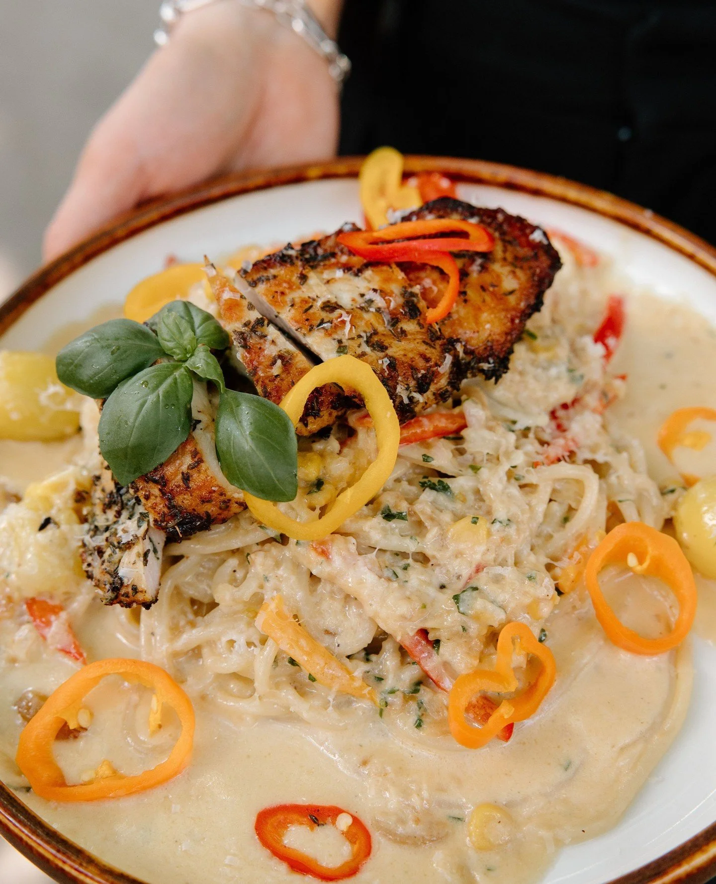 Meet your new comfort food obsession for summer, Spring Chicken Spaghetti ⁠
⁠
Herb-marinated chicken, silky confit garlic cream, sweet corn pur&eacute;e, and bright market vegetables tossed through spaghetti for the perfect rich-but-fresh pasta momen
