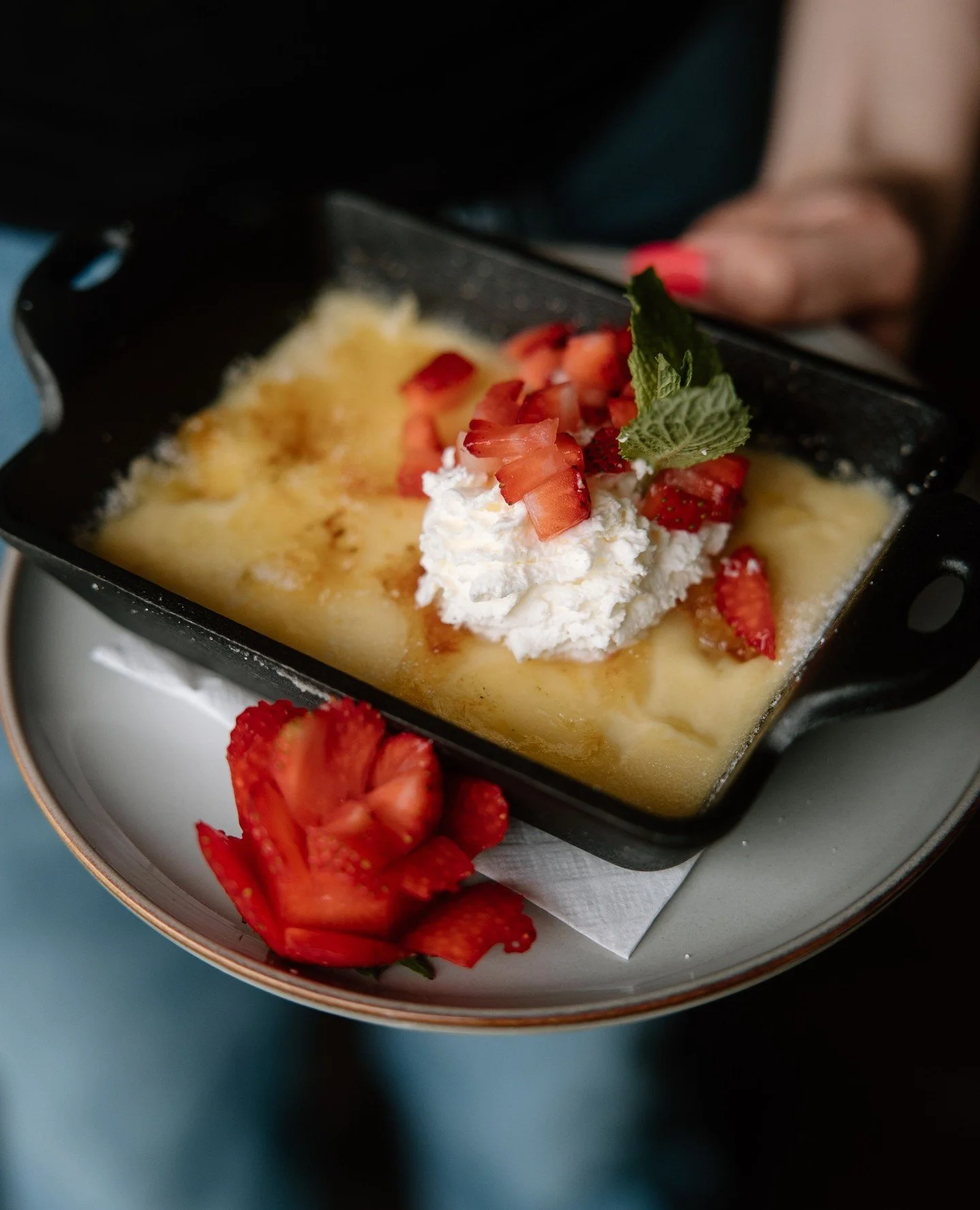 This month's feature dessert is a Strawberries &amp; Cream Cr&egrave;me Br&ucirc;l&eacute;e.⁠
It's a silky vanilla custard with that perfect sugar crack, topped with fresh summer strawberries and whipped cream.⁠
⁠
The sweetest way to end the night...
