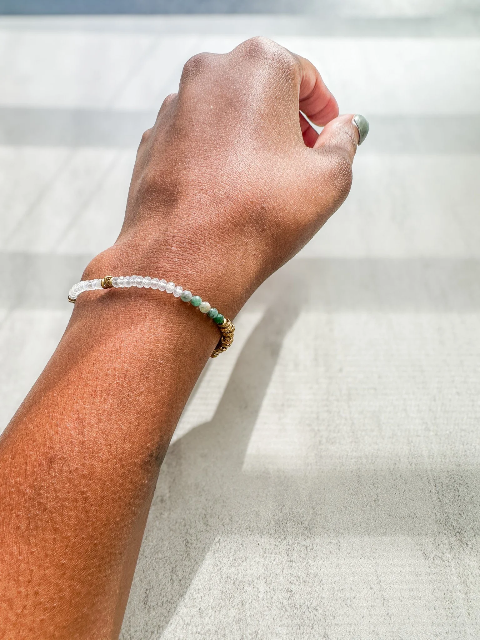 Vesper natural gemstone bracelet on wrist in sunlight