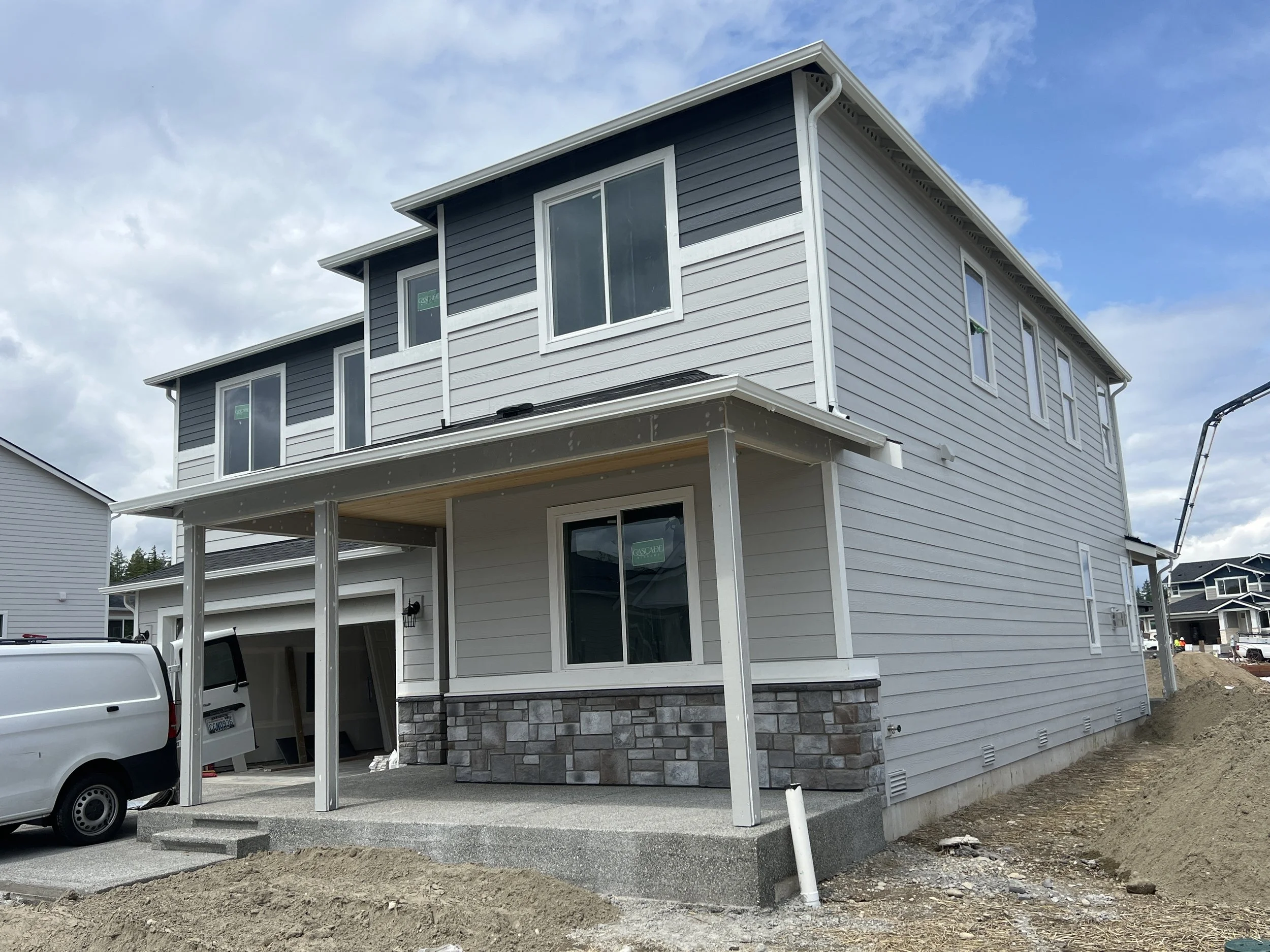 House exterior during siding installation