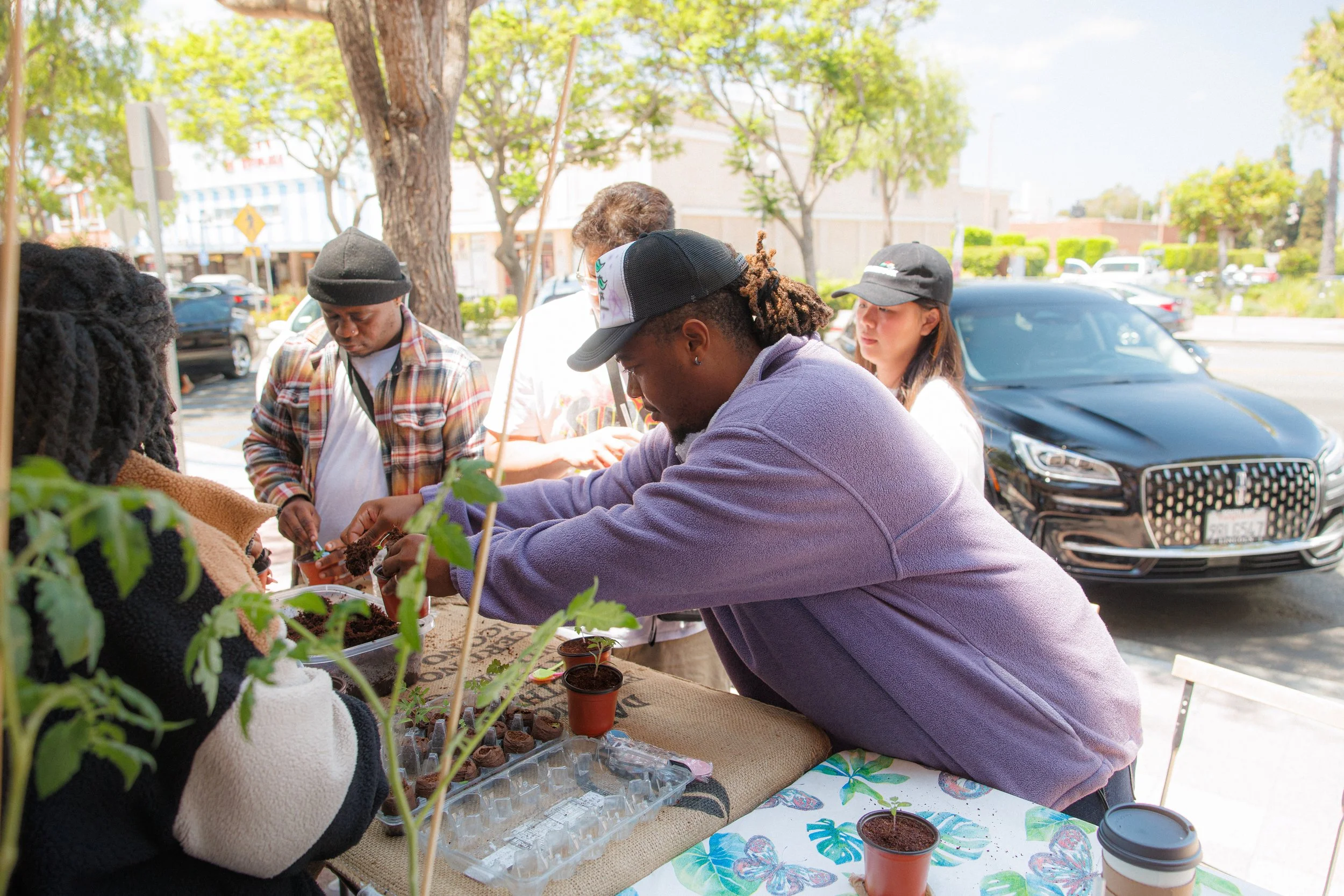 "The Seed", a workshop dedicated to showing people how they can start gardens with limited space. Showcasing that growth happens even in the most humble beginnings. Grow that tomato plant.