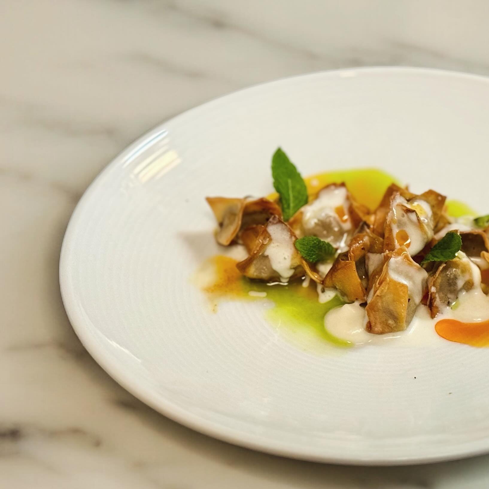 Next summer small plate is a dish that reminds of Istanbul&hellip; our version of manti!  Manti is a dumpling usually stuffed with meat but our version it&rsquo;s mushroom. With yogurt, red pepper oil &amp; parsley oil. (We do have an oat milk yogurt