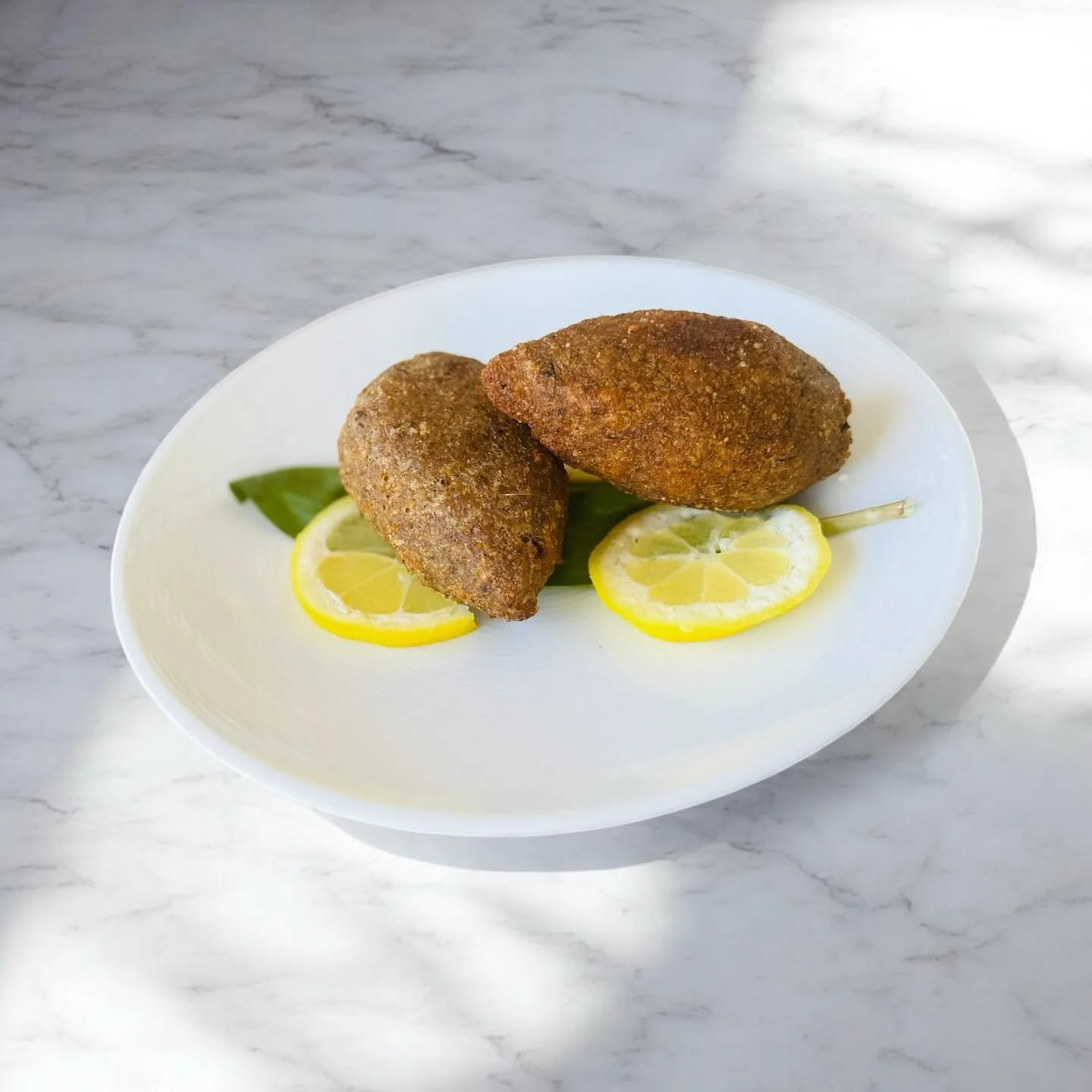 Now Serving: Northern Lebanese Lent Kibbeh &mdash; Limited Time Only!

Our newest dish is a tribute to the mountains of North Lebanon: Northern-style Lent Kibbeh &mdash; a unique, plant-based take on the classic.

Crafted with a soft outer shell made