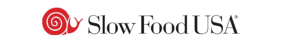 Logo for Slow Food USA featuring a red snail icon and black text.