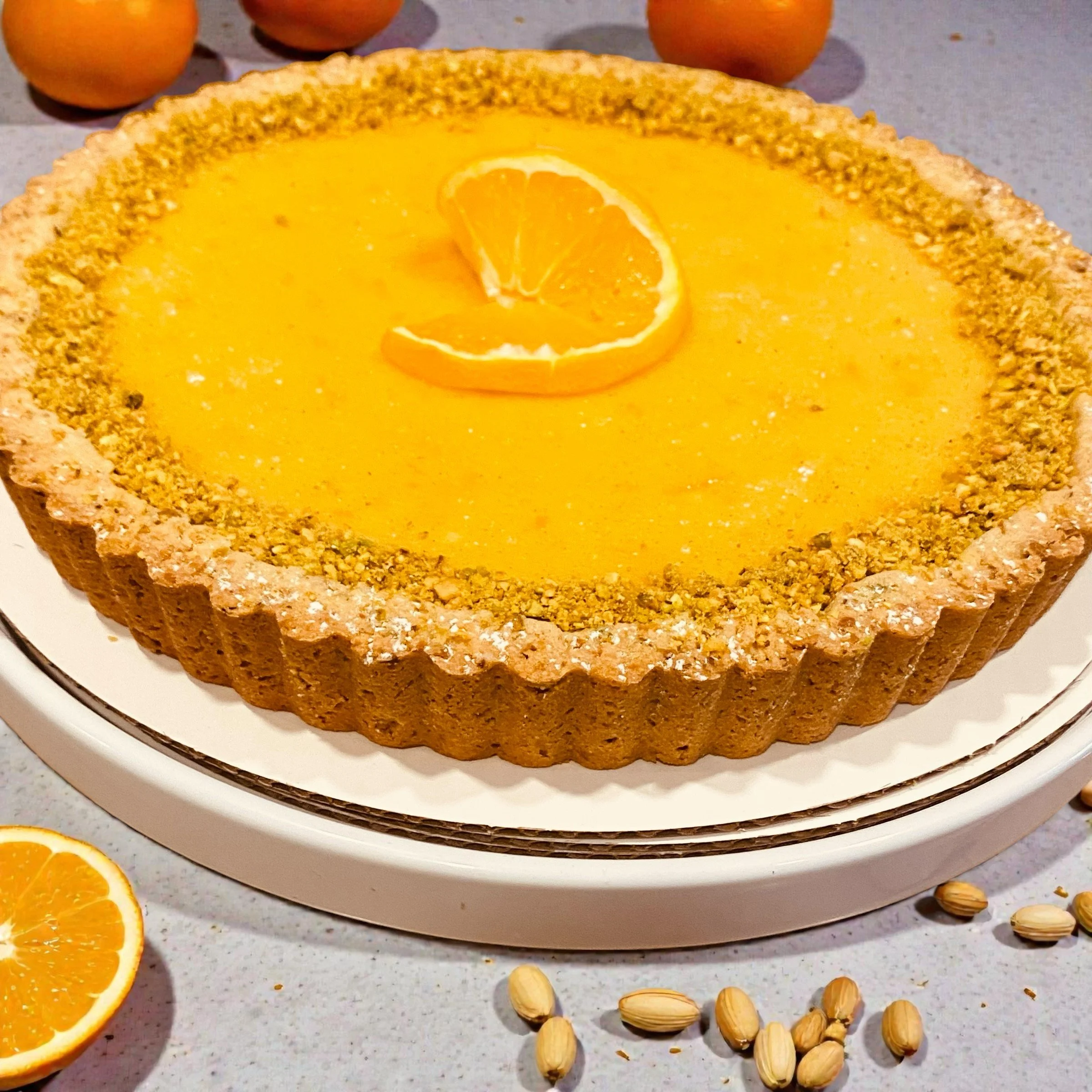4 " ORANGE CARDAMOM TART WITH PISTACHIO CRUST