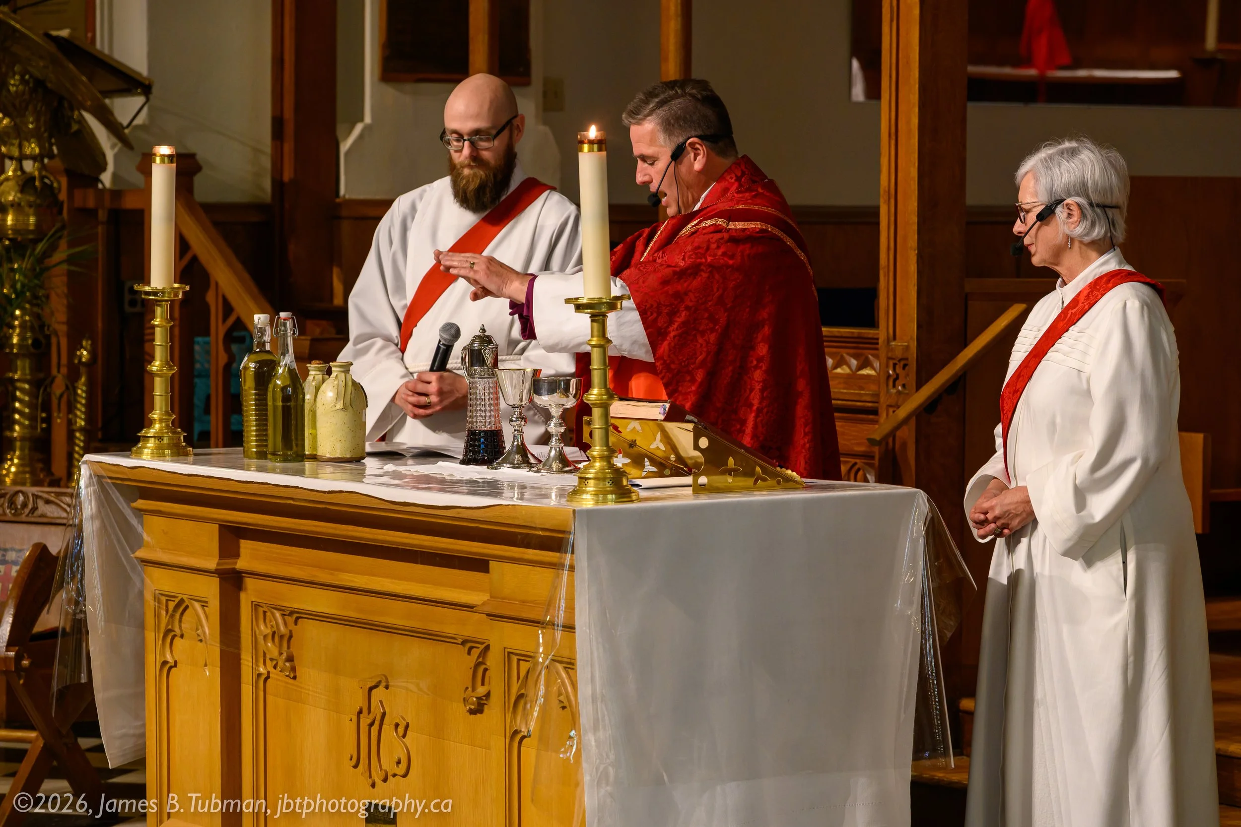 Bishop Michael Hawkins blesses healing oils and chrism.