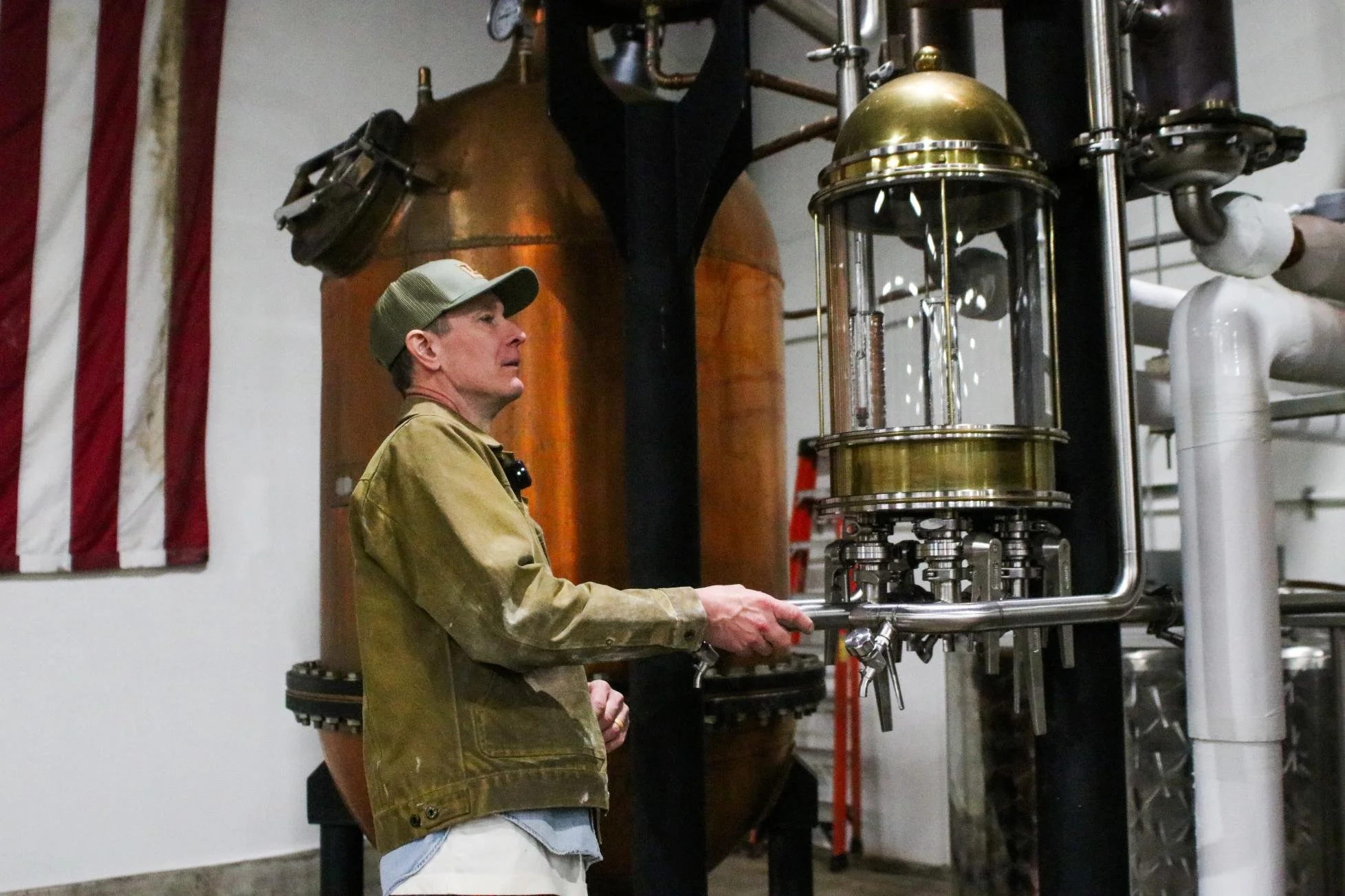 Tahwahkaro Distillery Justin Working Distillery.jpg