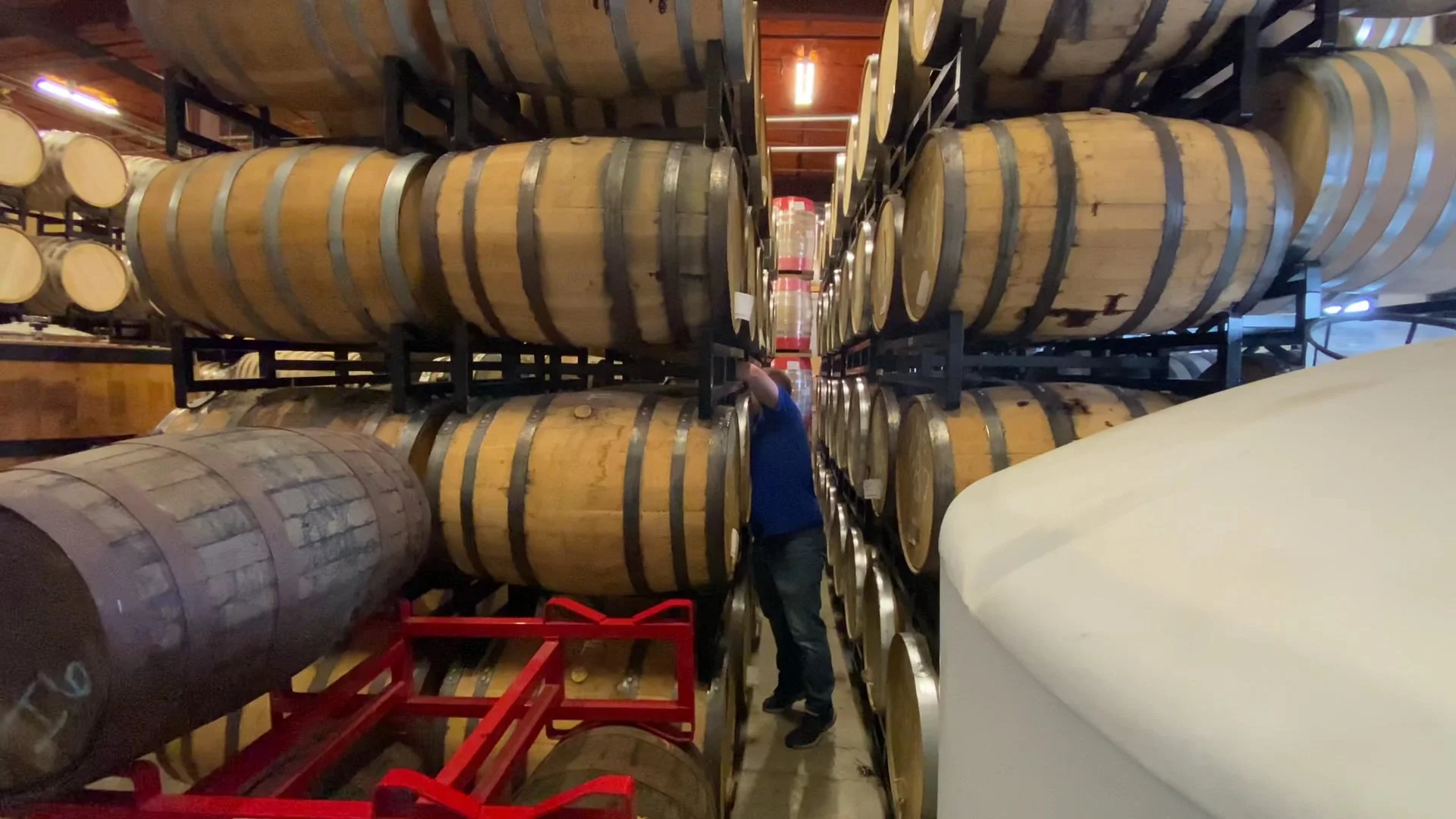 IronRoot Republic Distillery barrel warehouse worker.jpg