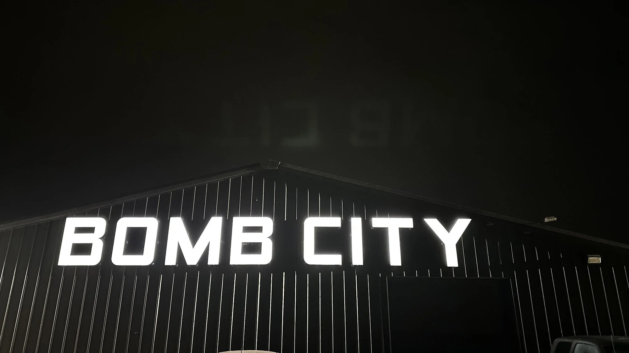 Bomb City Distilling night neon sign.jpg