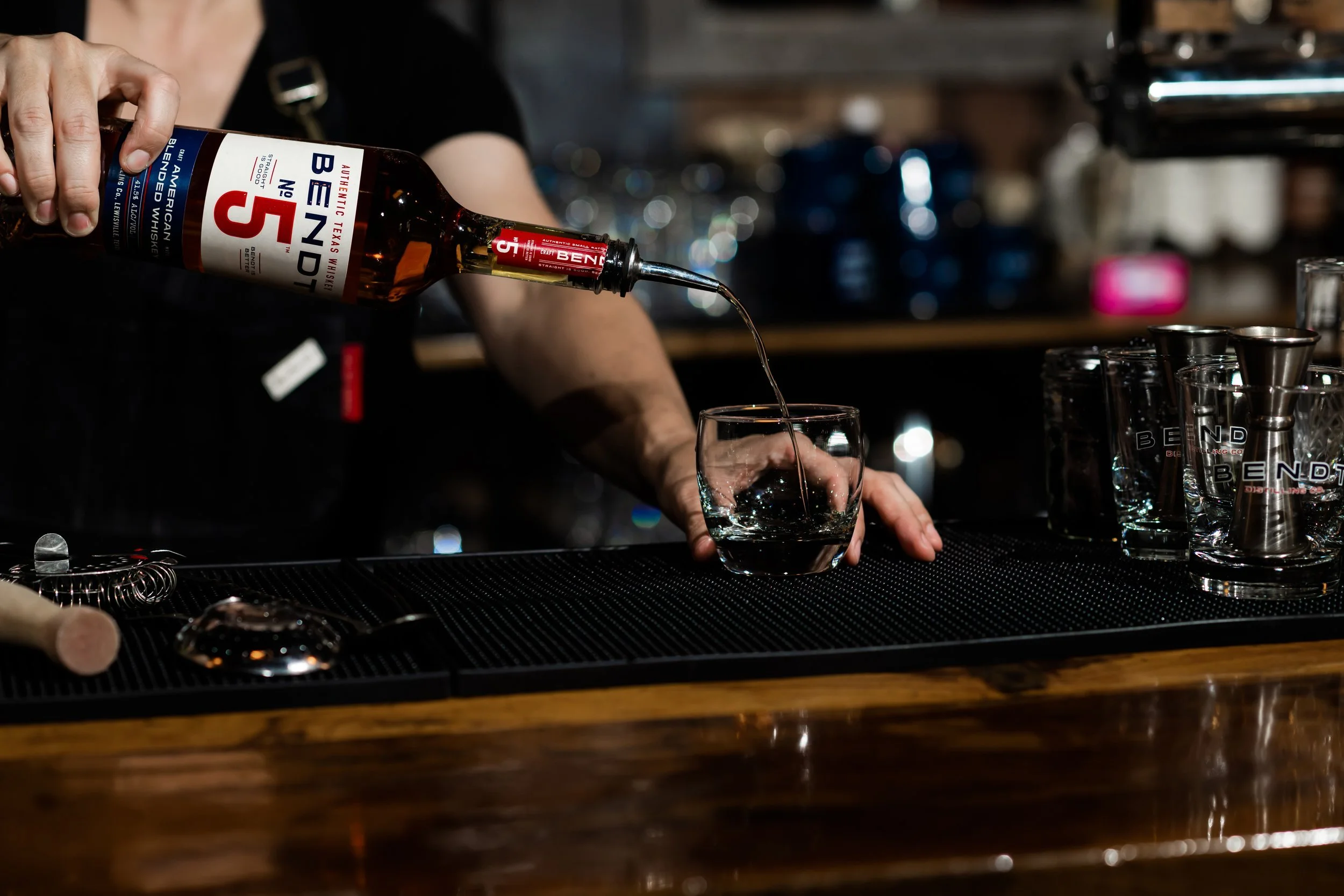 BENDT Distilling Co bartender pouring.jpg