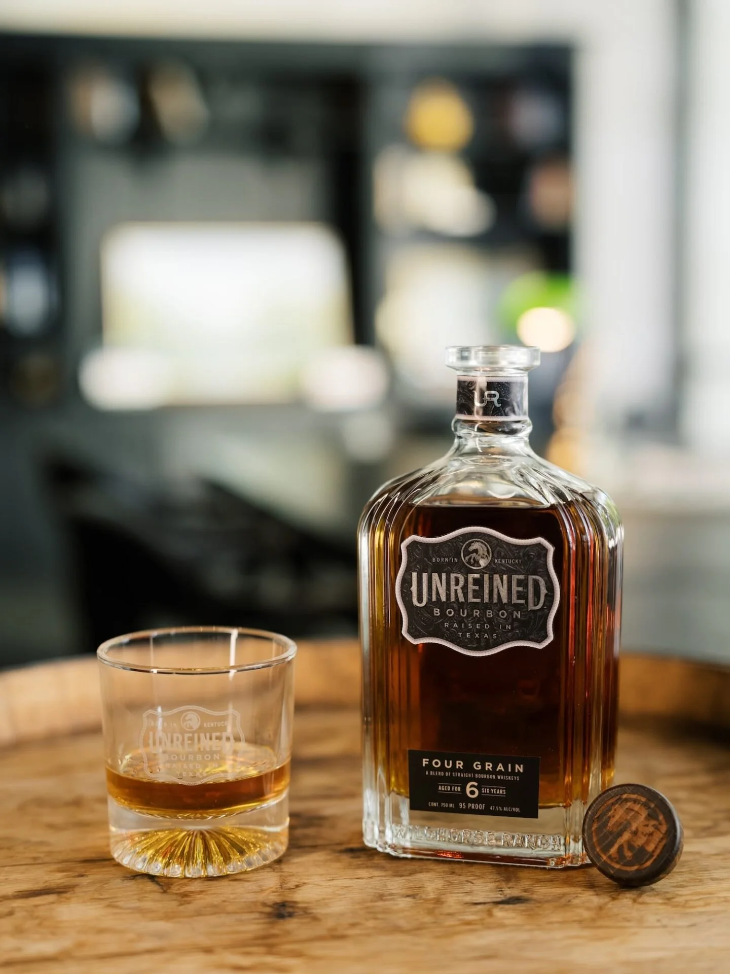 Unreined Bourbon branded lifestyle shot.jpg