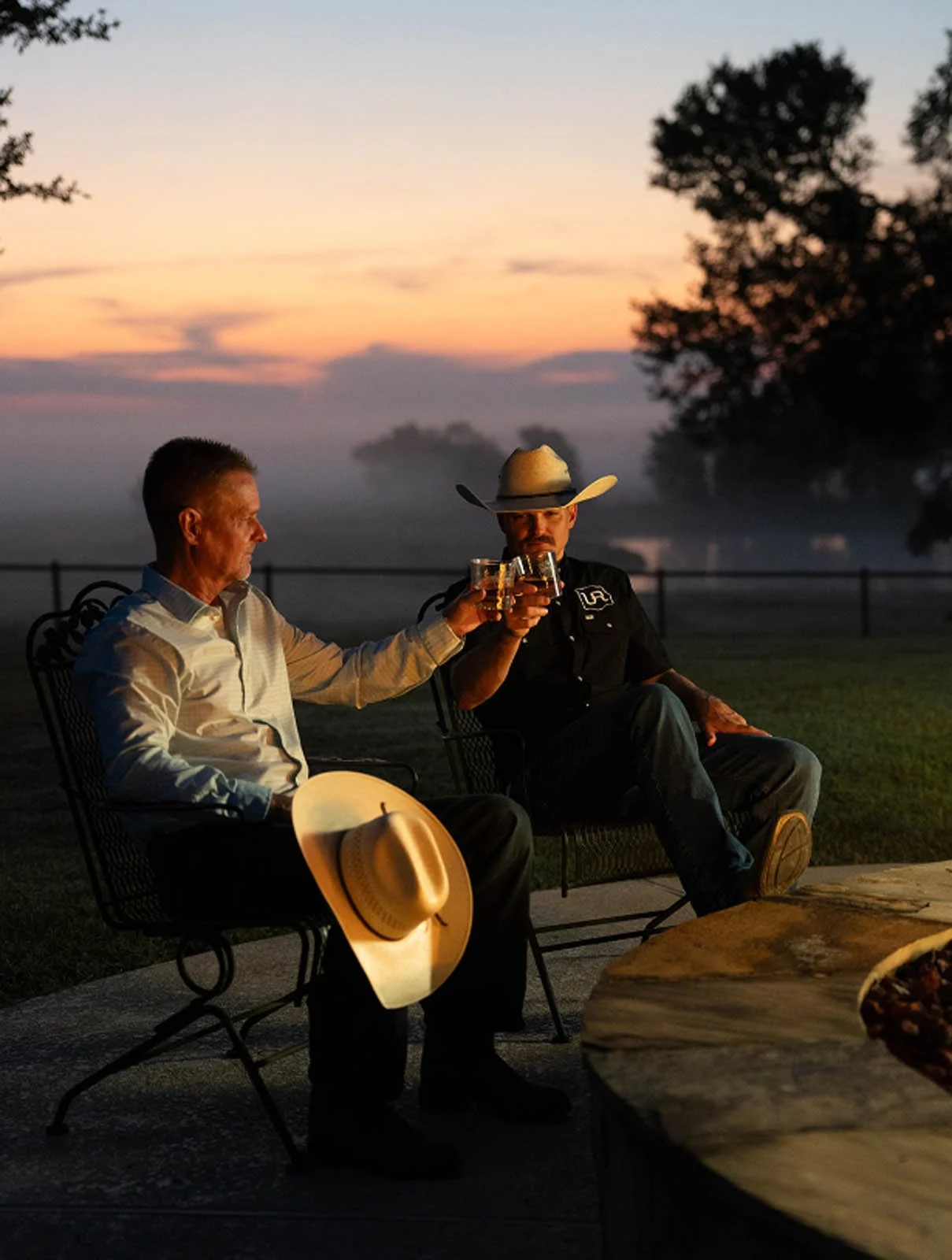 Unreined Bourbon fireside toast gathering.jpg