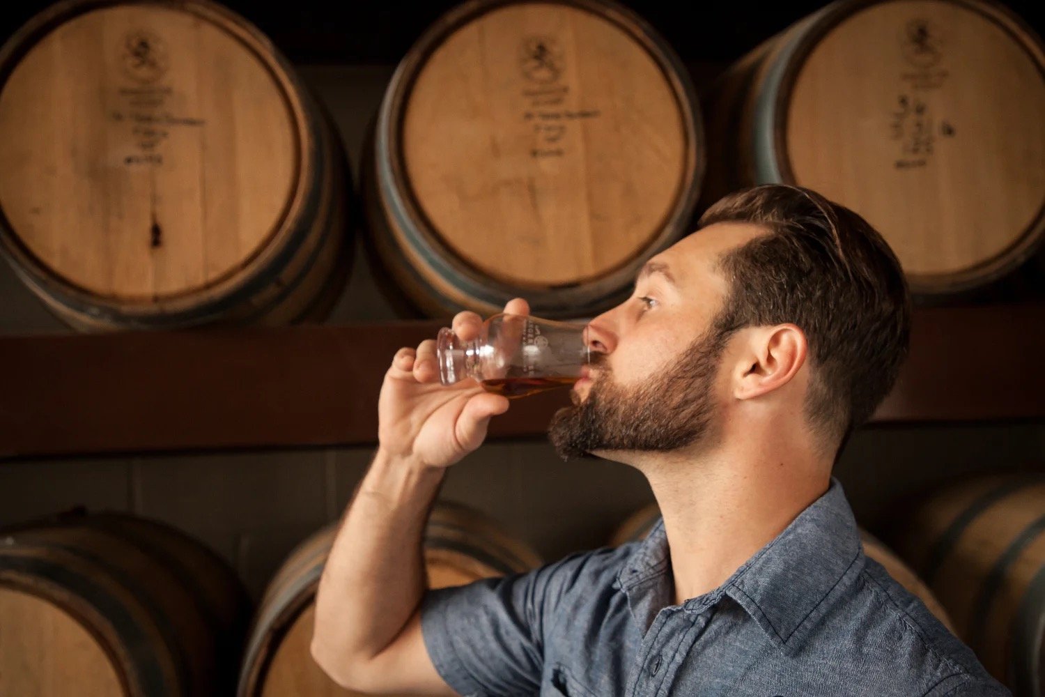 Ranger Creek Distilling person enjoying glass.jpg