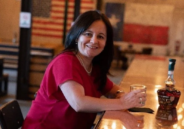Giant Texas Distillers woman tasting bar.jpg
