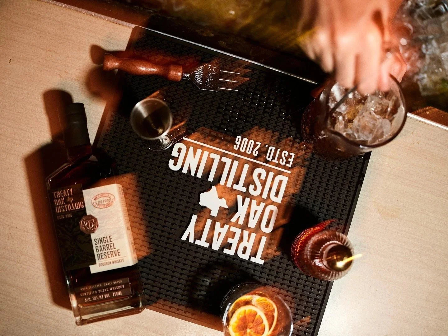 Treaty Oak Distilling bartender crafting cocktails.jpg