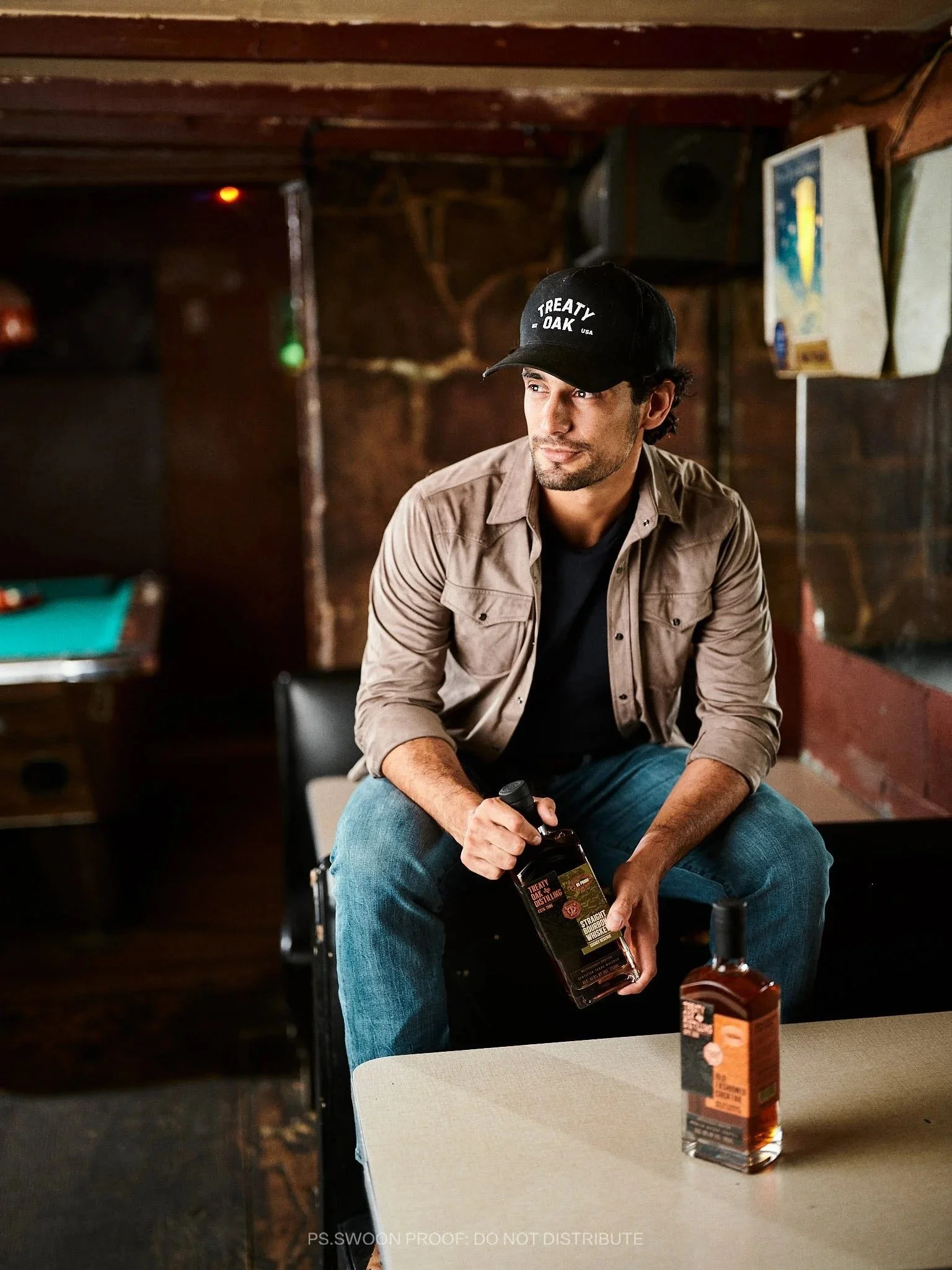 Treaty Oak Distilling man rustic bar.jpg