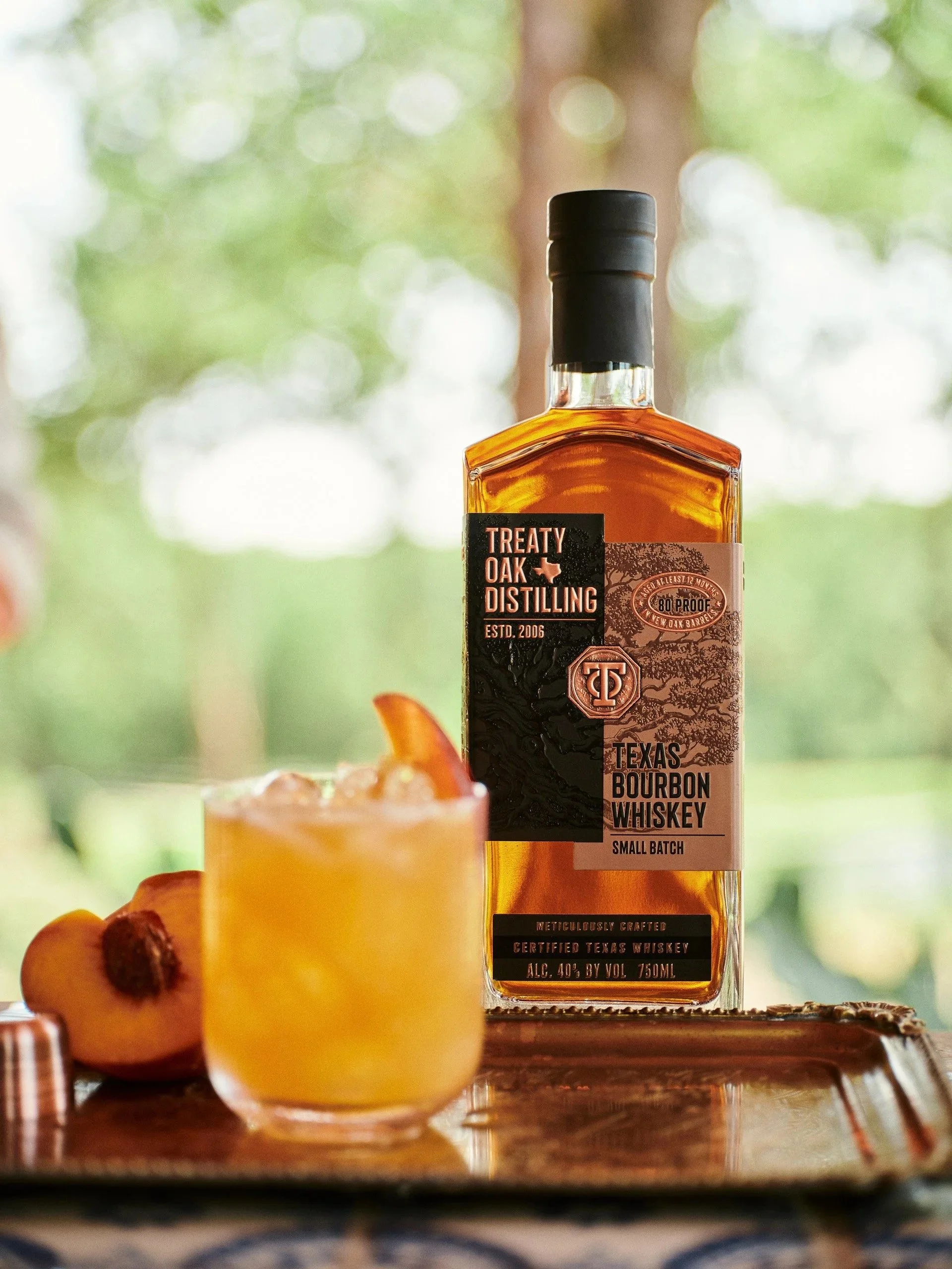 Treaty Oak Distilling peach cocktail lifestyle.jpg