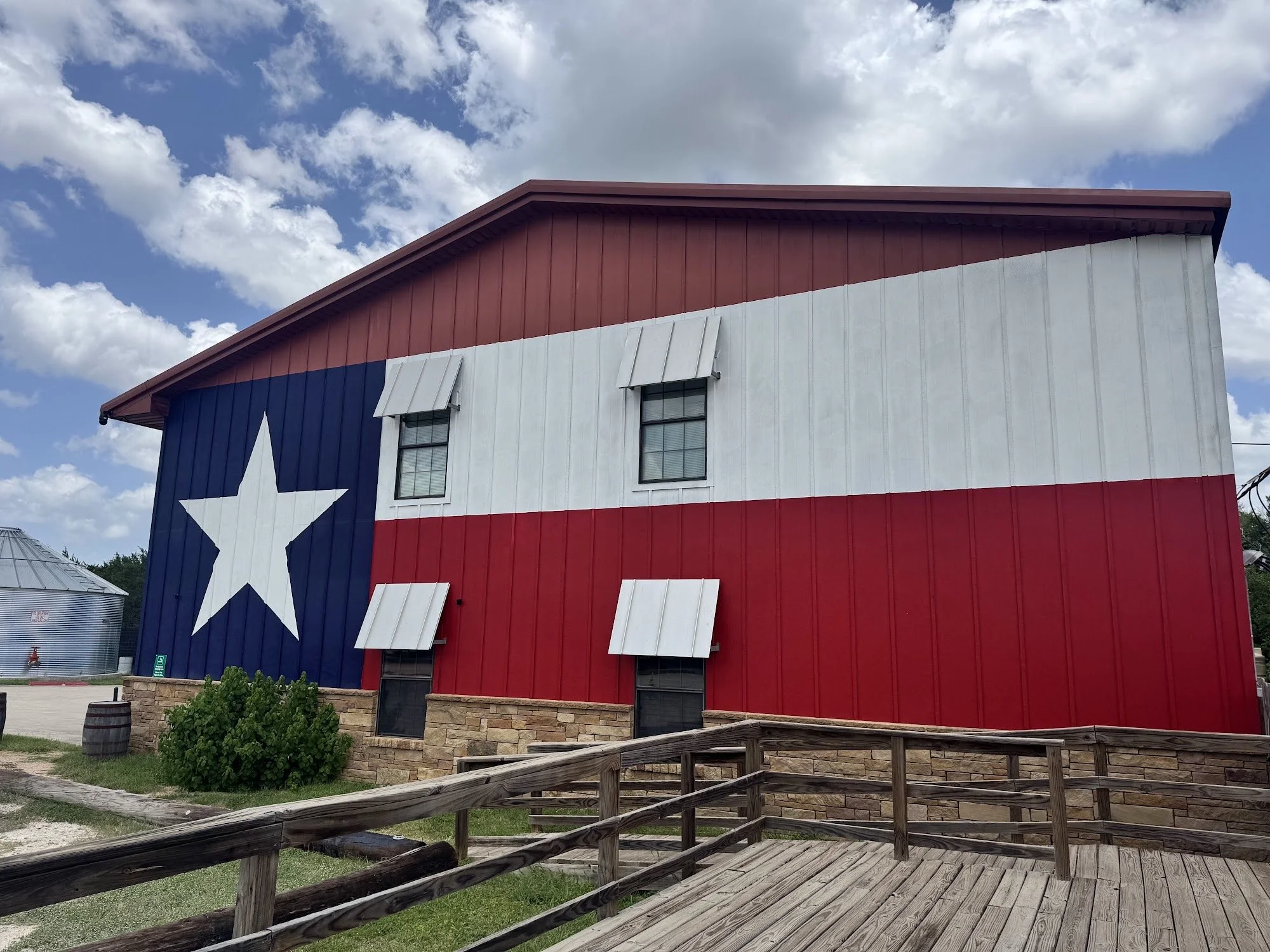 Treaty Oak Distilling texas flag barn.jpg